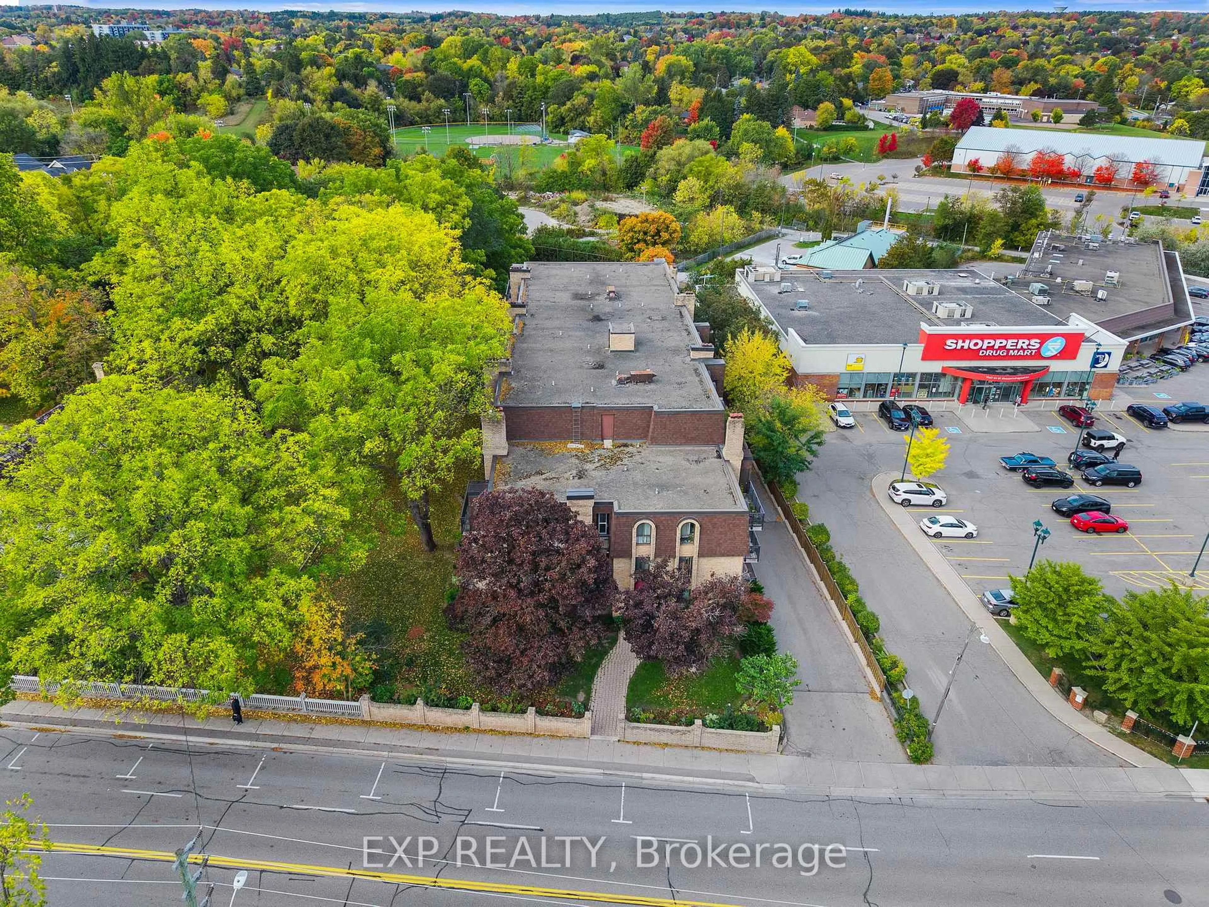 A pic from outside/outdoor area/front of a property/back of a property/a pic from drone, unknown for 15390 Yonge St #203, Aurora Ontario L4G 1N8