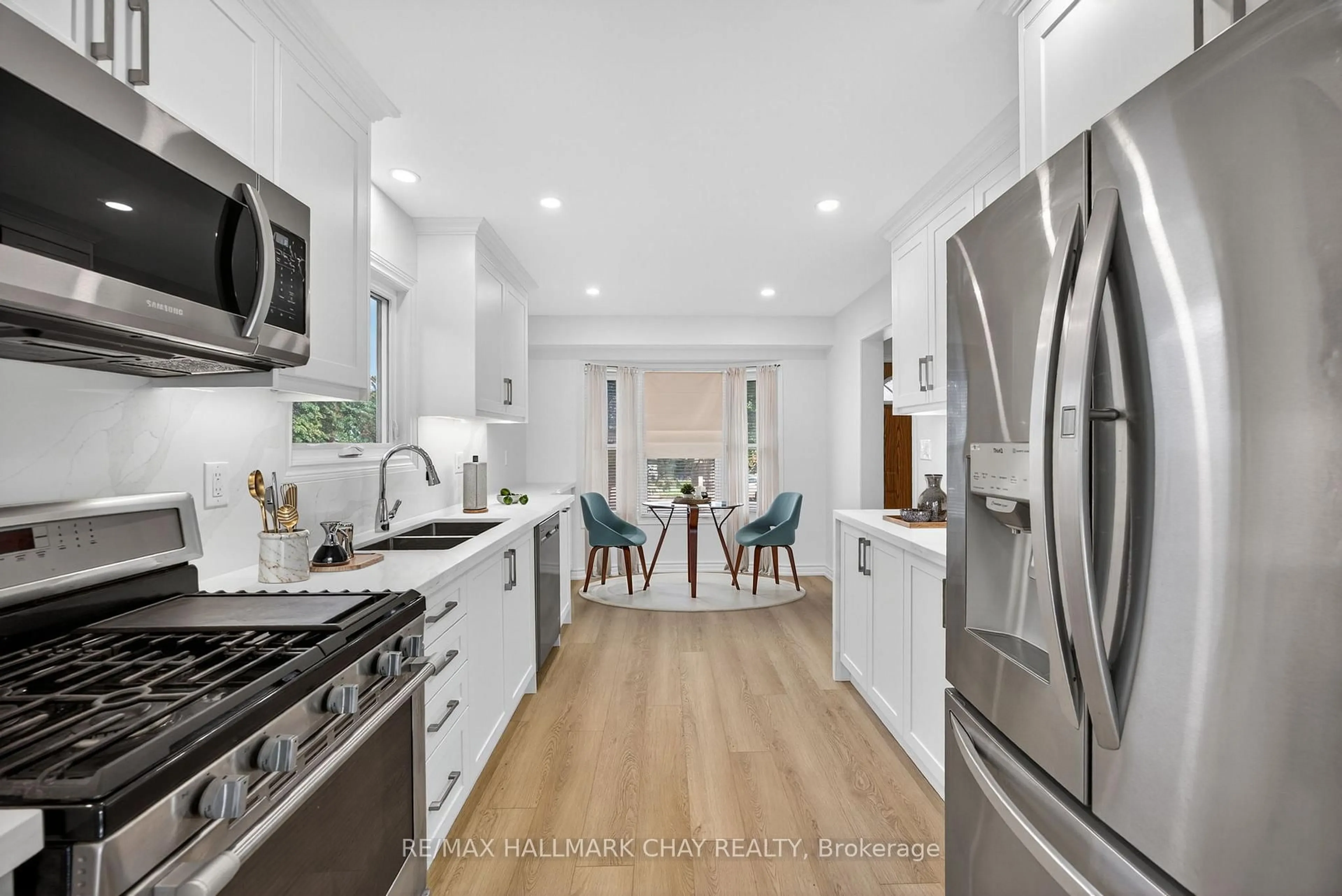 Open concept kitchen, ceramic/tile floor for 714 Candaras St, Innisfil Ontario L9S 2G9
