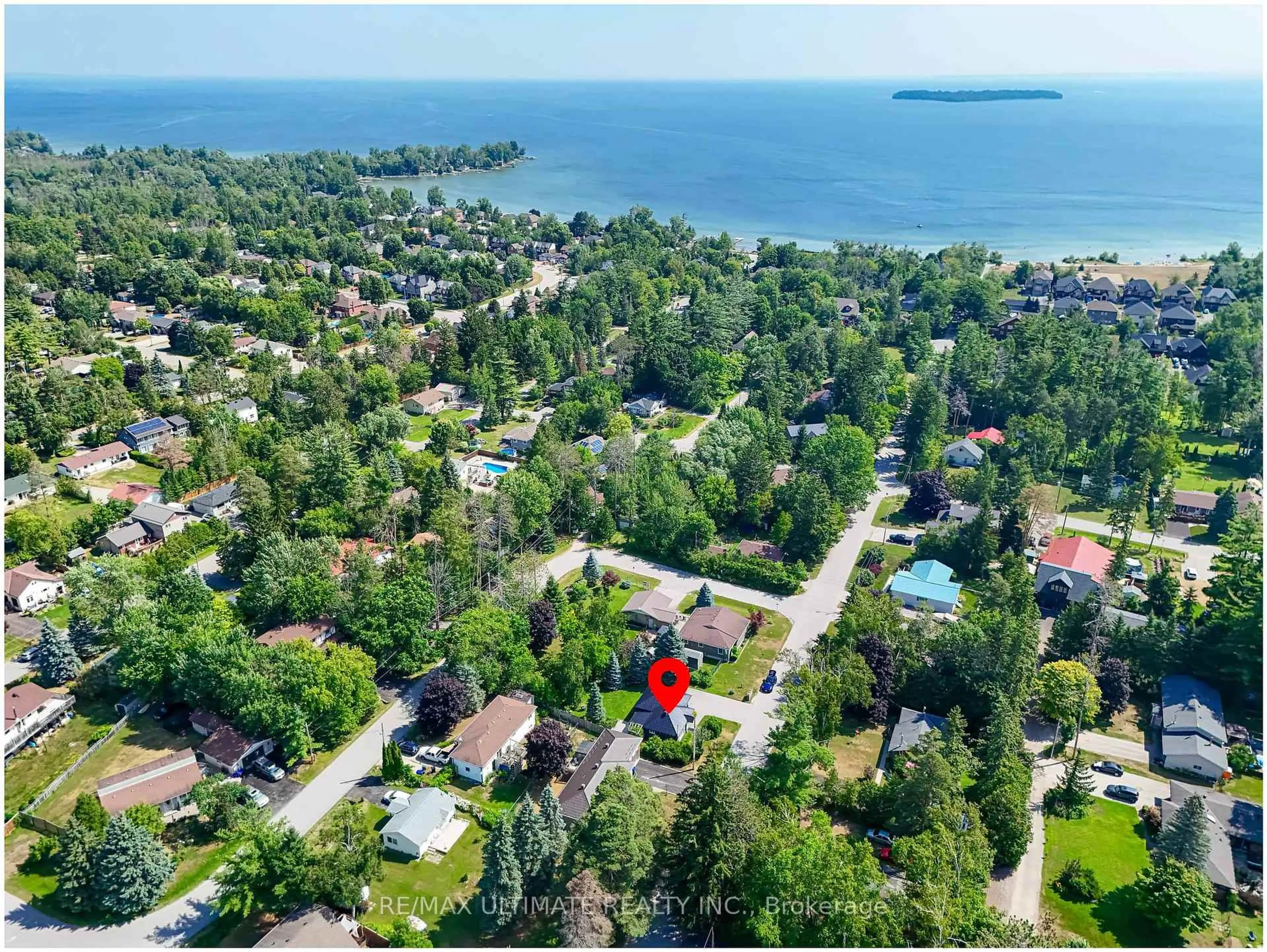 A pic from outside/outdoor area/front of a property/back of a property/a pic from drone, water/lake/river/ocean view for 760 Florence Rd, Innisfil Ontario L9S 2E2