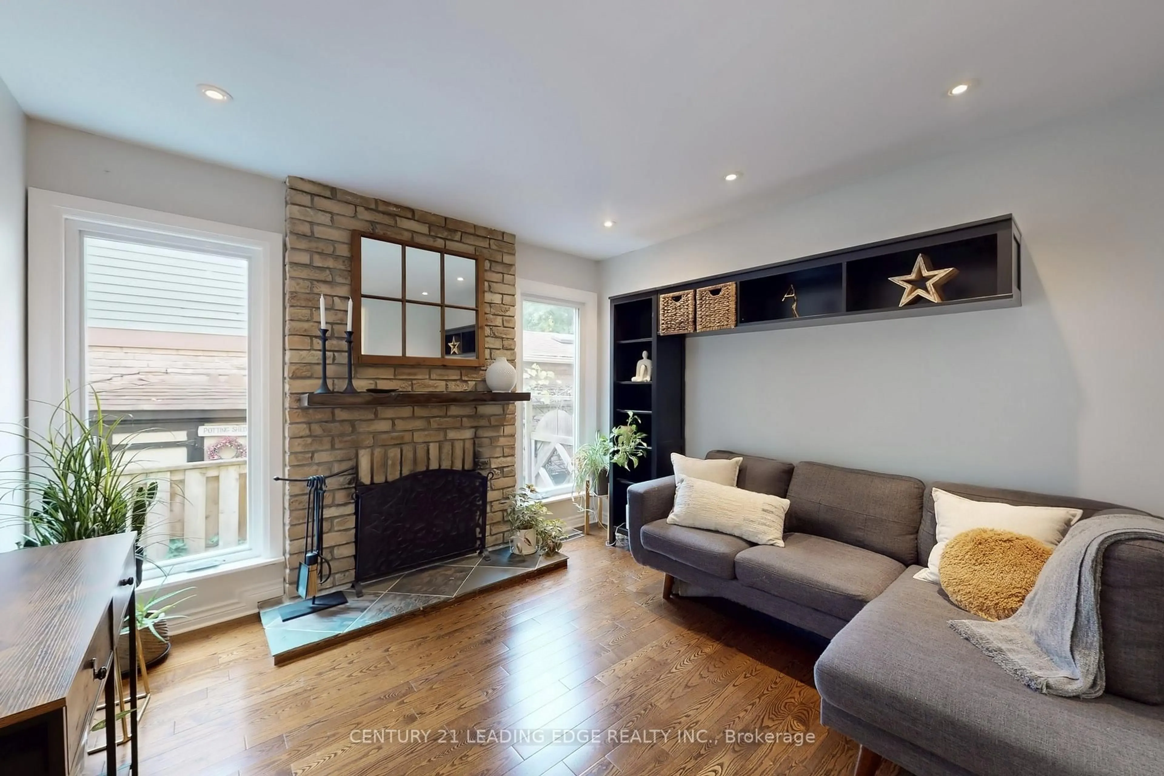 Living room with furniture, wood/laminate floor for 43 Karma Rd, Markham Ontario L3R 4S8