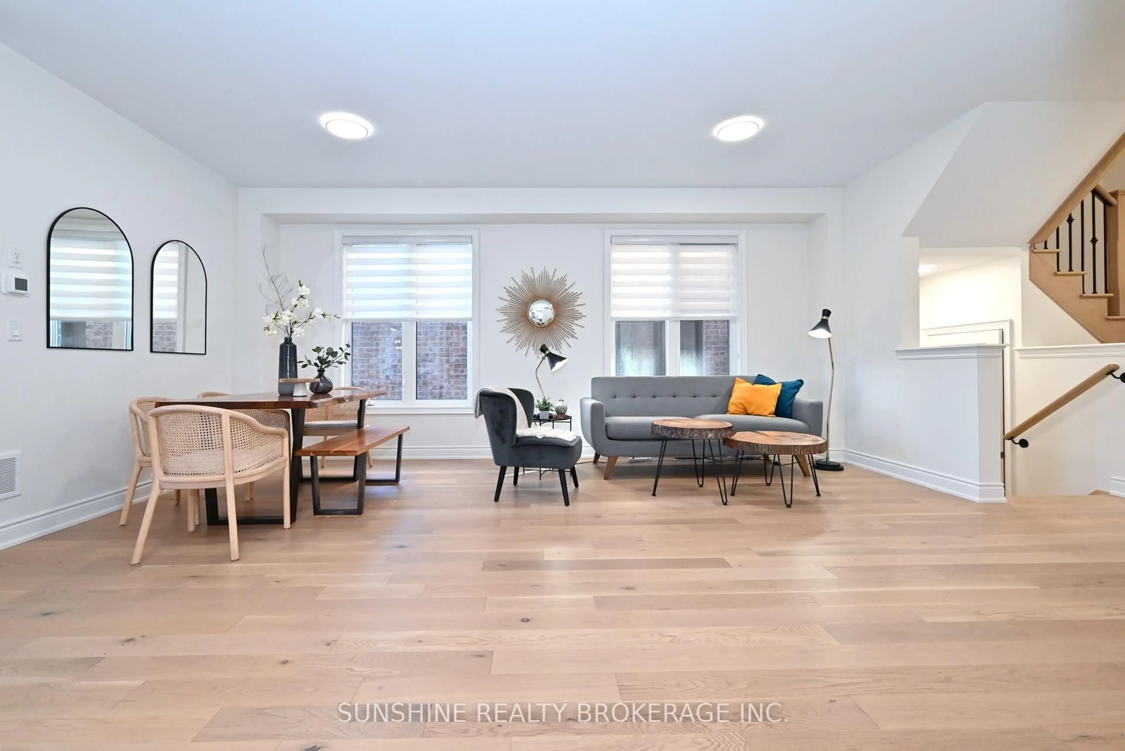 Living room with furniture, wood/laminate floor for 12 Meadow Vista Cres, East Gwillimbury Ontario L9N 0T4