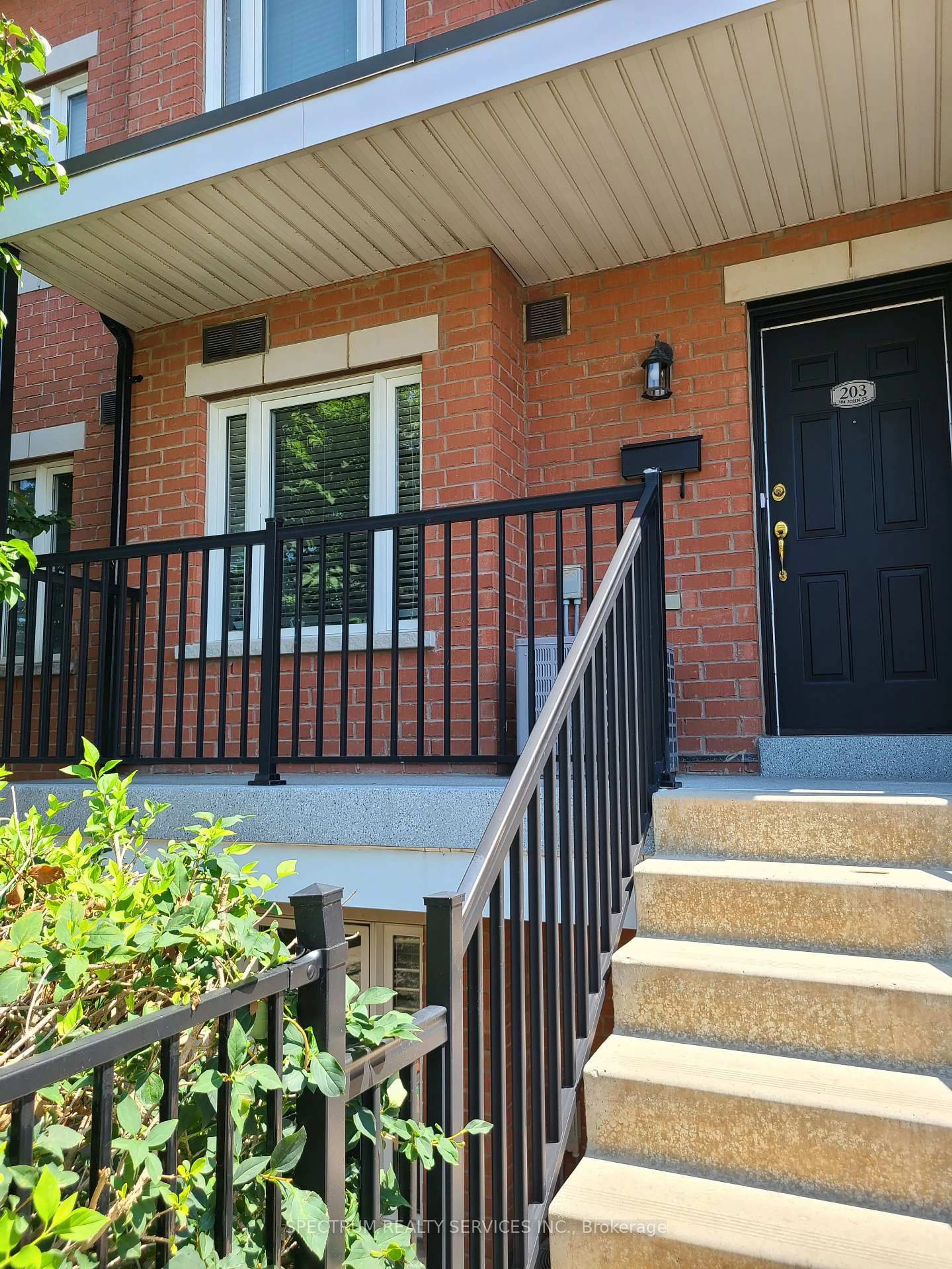 Home with brick exterior material, street for 308 John St #203, Markham Ontario L3T 0A7