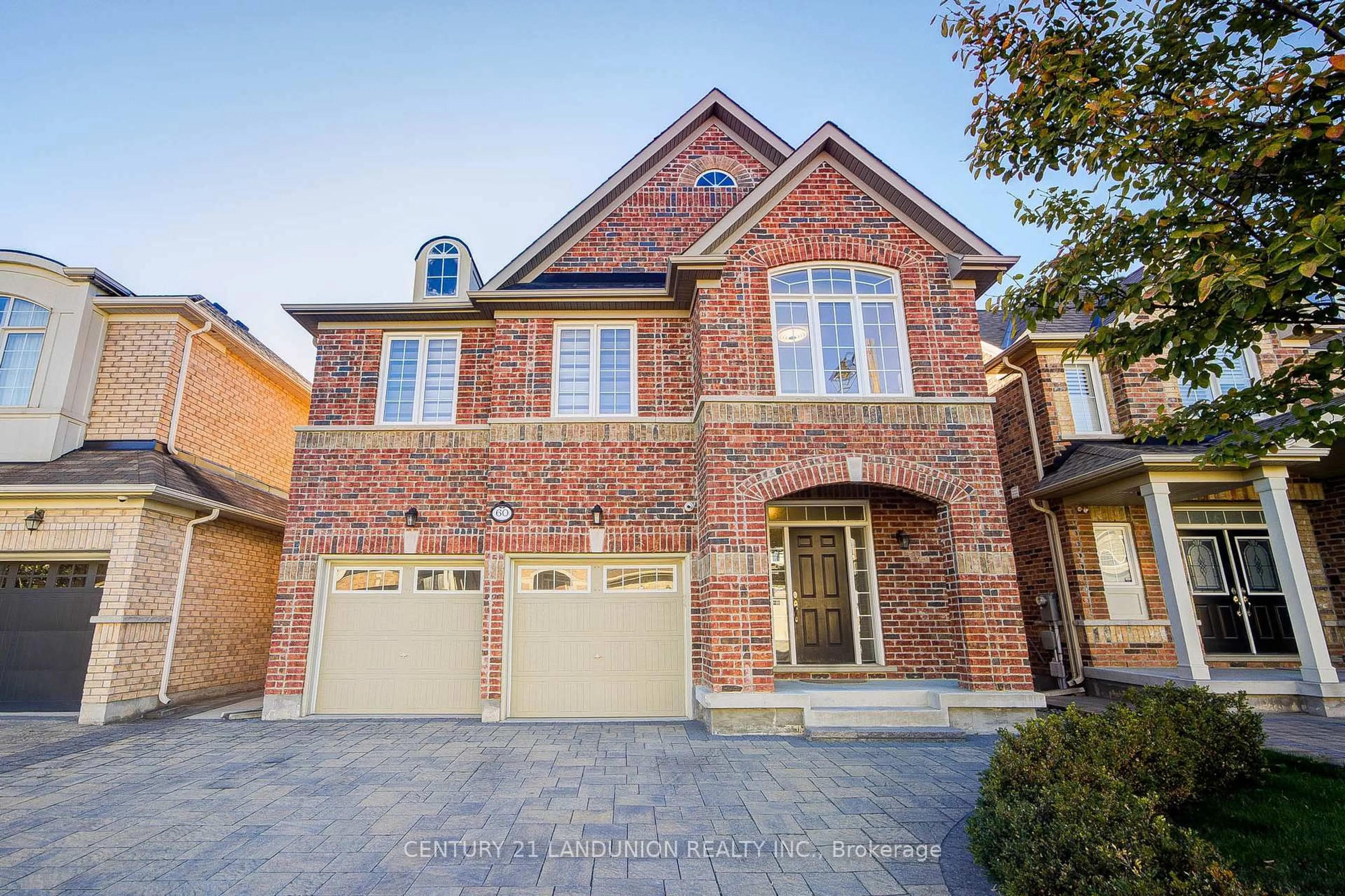 Home with brick exterior material, street for 60 James Joyce Dr, Markham Ontario L6C 0N7