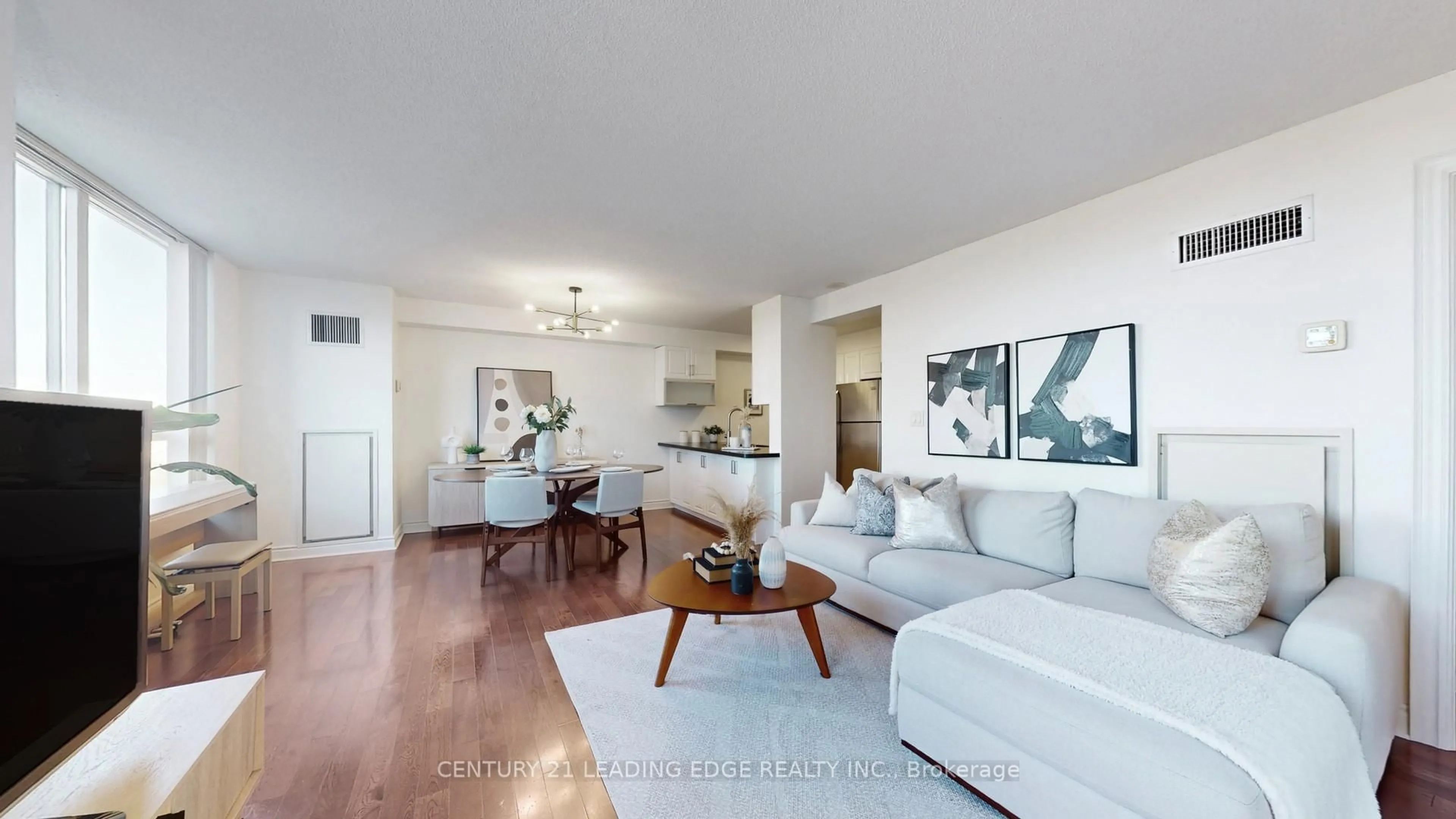 Living room with furniture, wood/laminate floor for 88 Times Ave #911, Markham Ontario L3T 7Z4