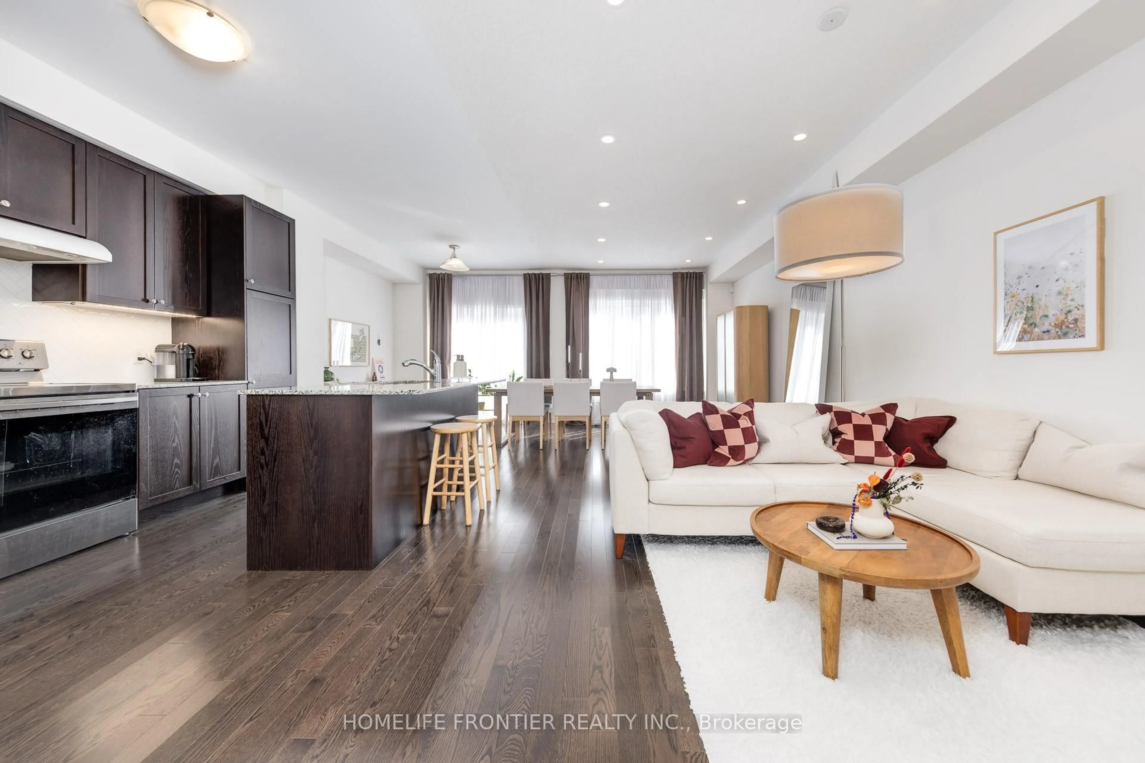 Open concept kitchen, wood/laminate floor for 29 Bellflower Lane, Richmond Hill Ontario L4E 0E4