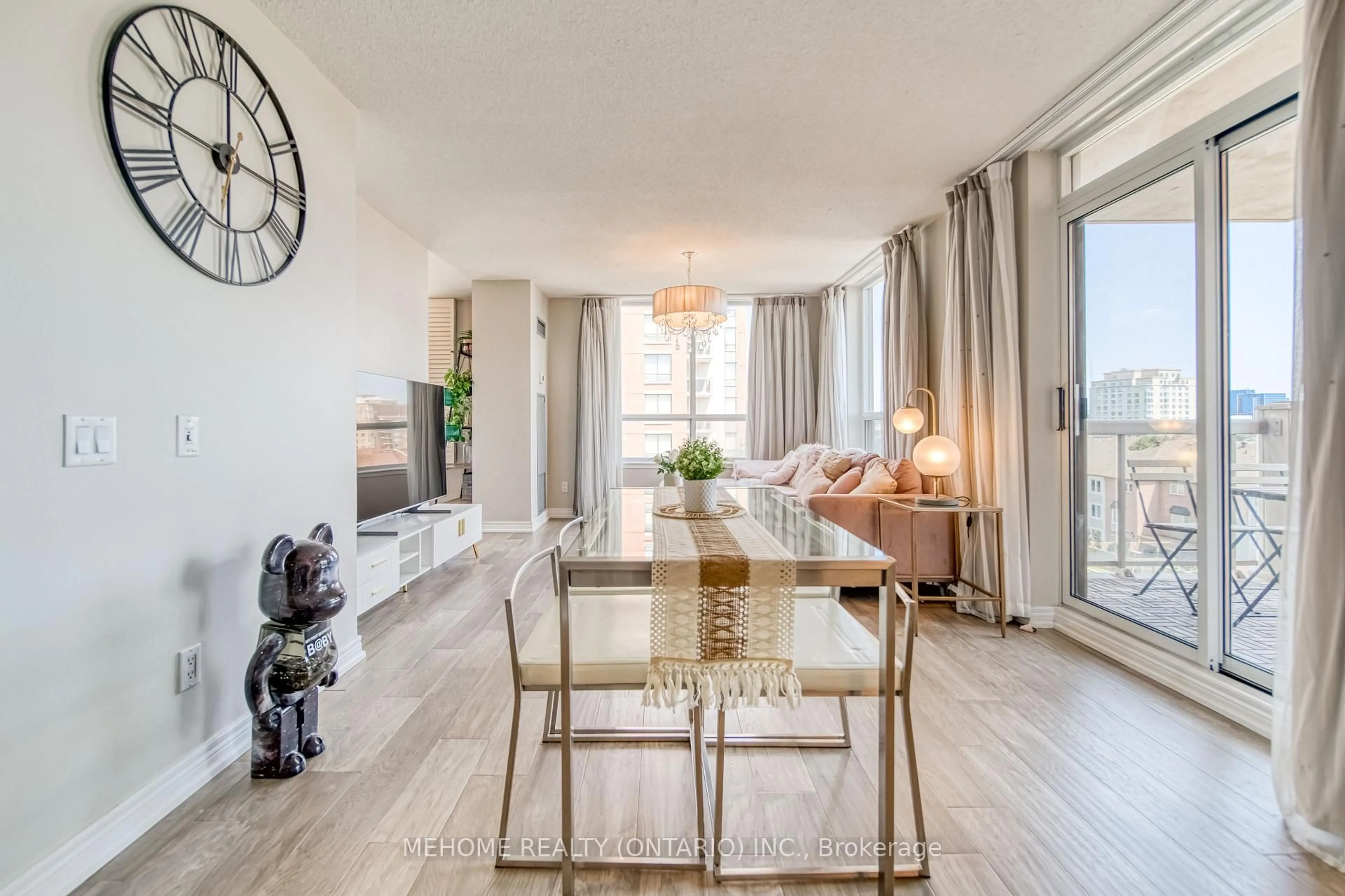 Living room with furniture, wood/laminate floor for 25 Times Ave #610, Markham Ontario L3T 7X5