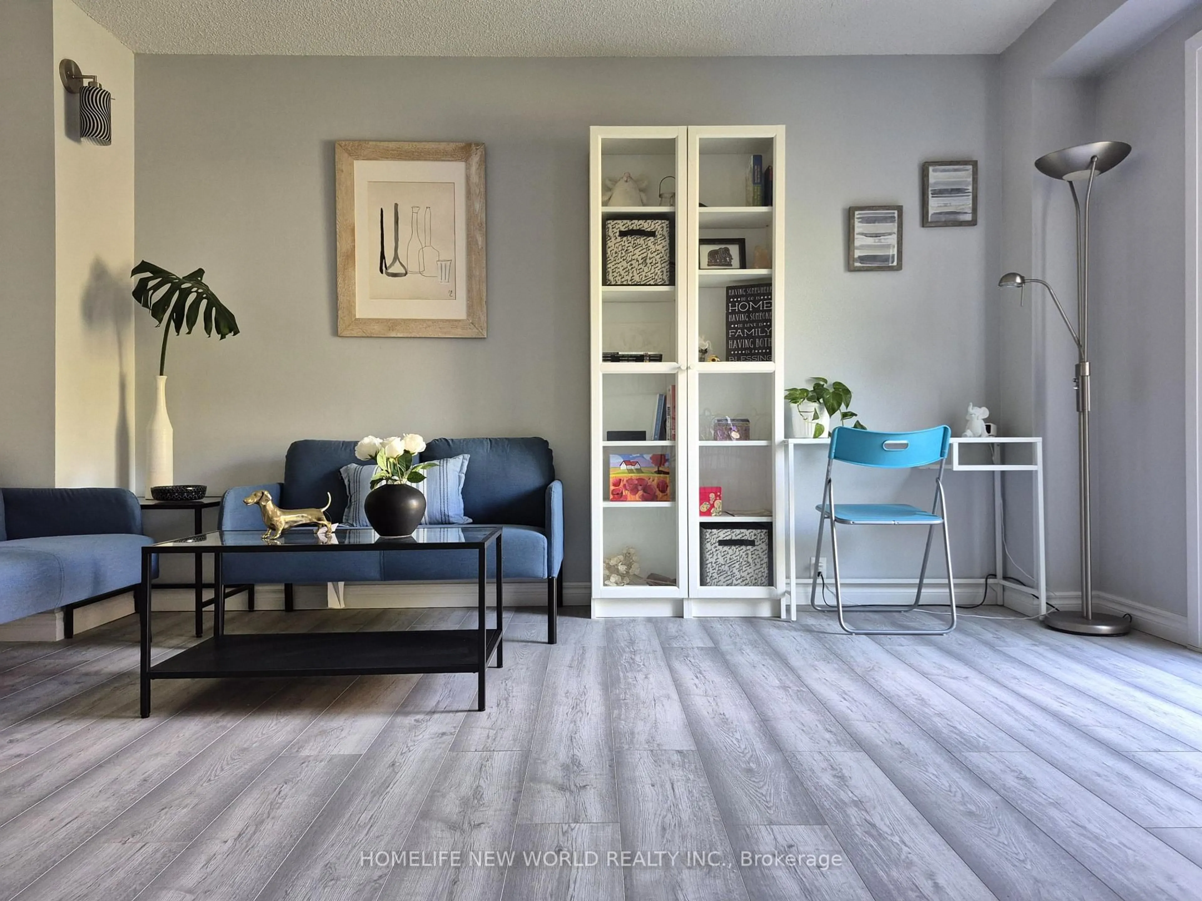 Living room with furniture, wood/laminate floor for 88 Madsen Cres, Markham Ontario L3R 4P3