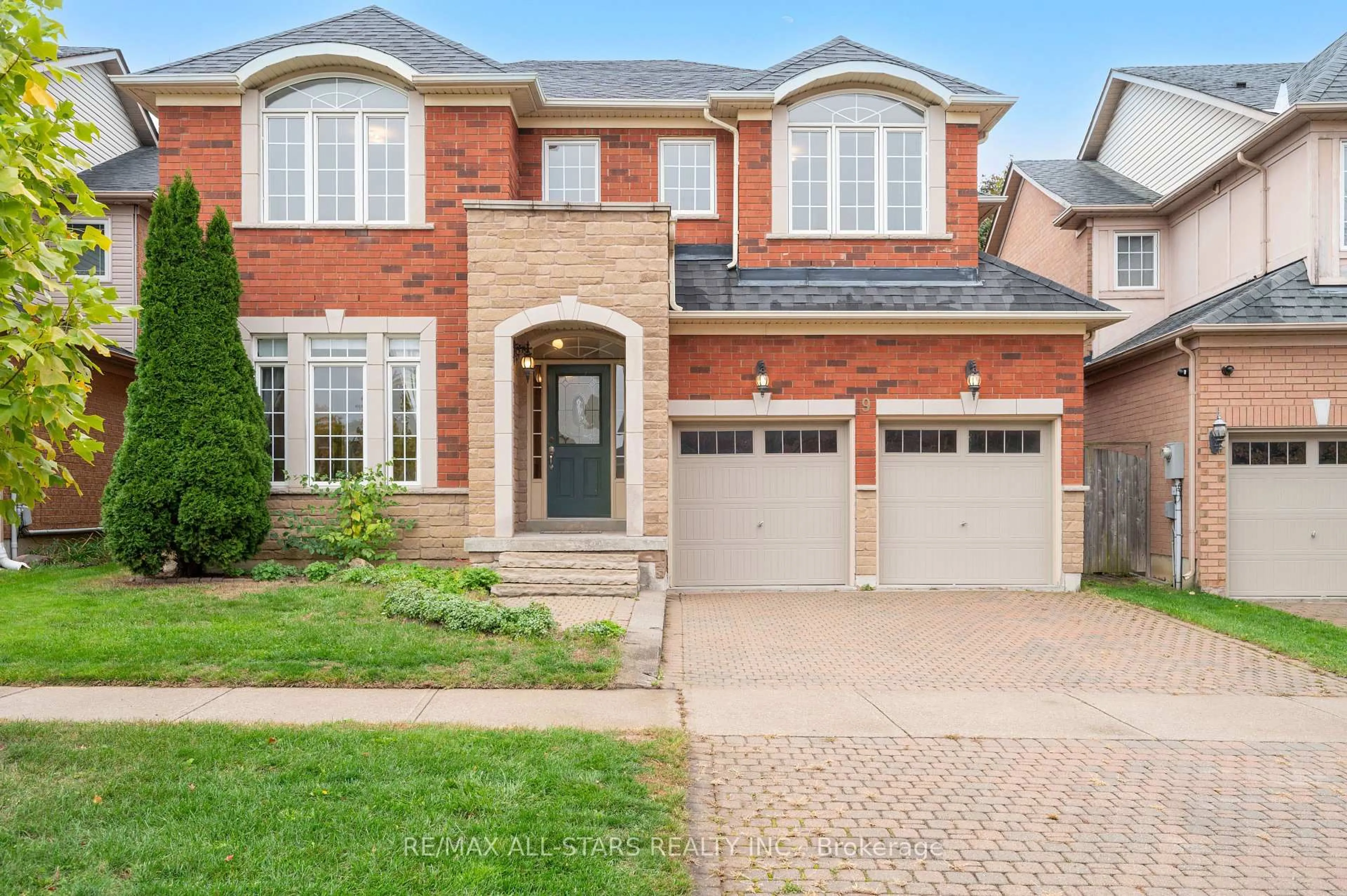 Home with brick exterior material, street for 9 Wood Thrush Ave, Markham Ontario L3S 4A8