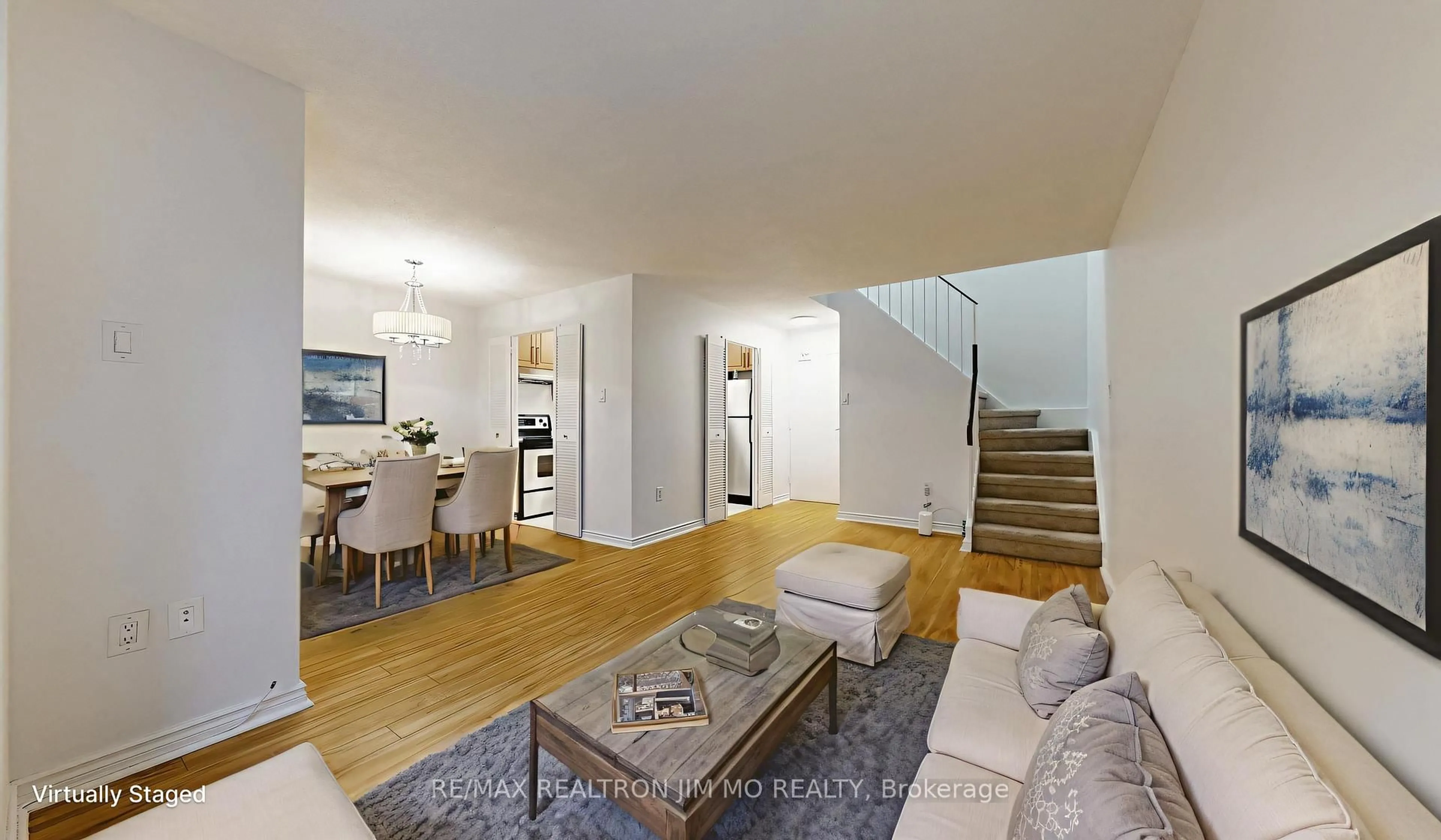Living room with furniture, wood/laminate floor for 16 Elgin St #332, Markham Ontario L3T 4T4