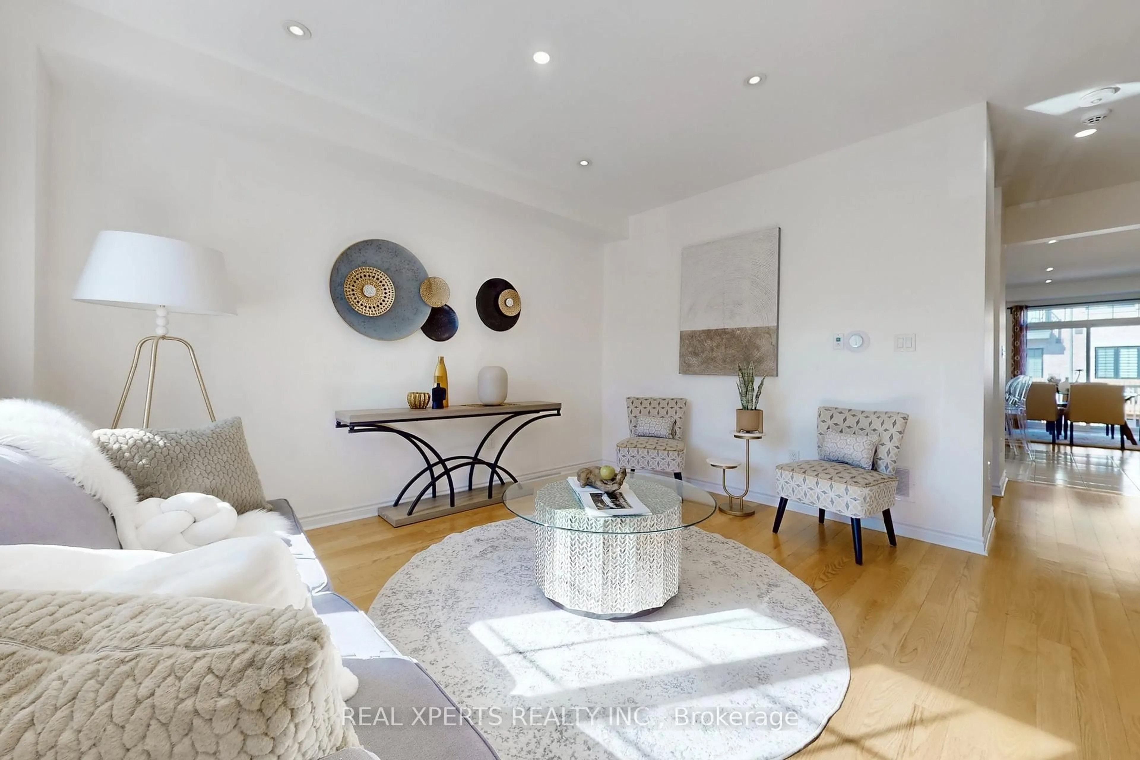 Living room with furniture, wood/laminate floor for 18 Farooq Blvd, Vaughan Ontario L4H 4P3