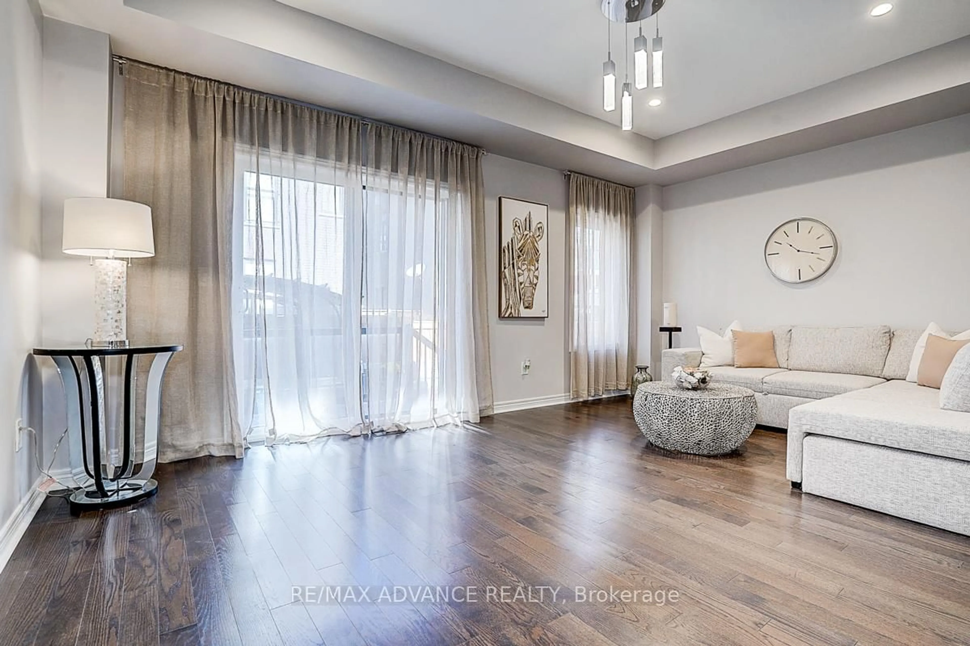 Living room with furniture, wood/laminate floor for 30 Laskin Dr, Vaughan Ontario L6A 5A4