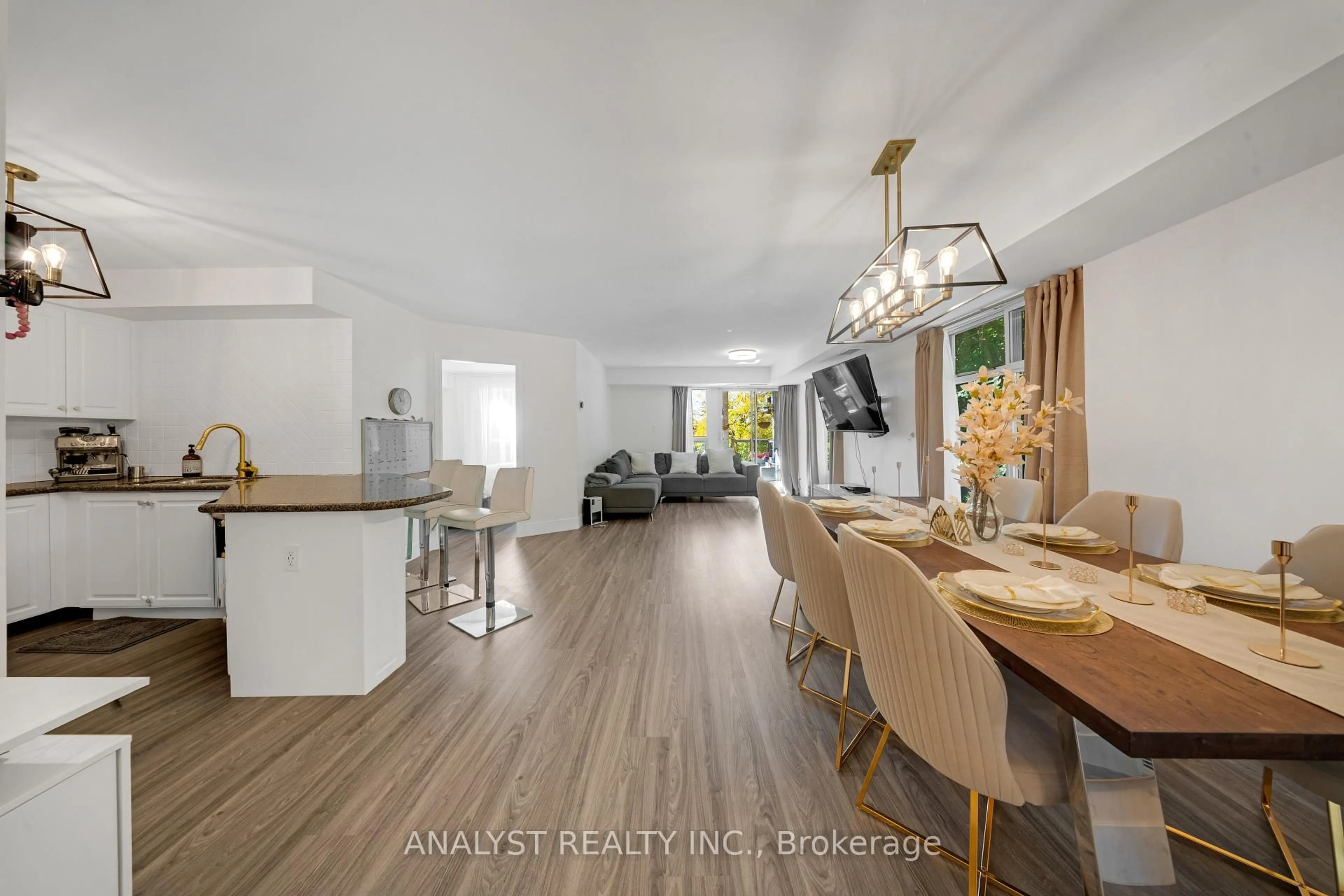 Open concept kitchen, wood/laminate floor for 245 Pine Grove Rd #107, Vaughan Ontario L4L 2H7