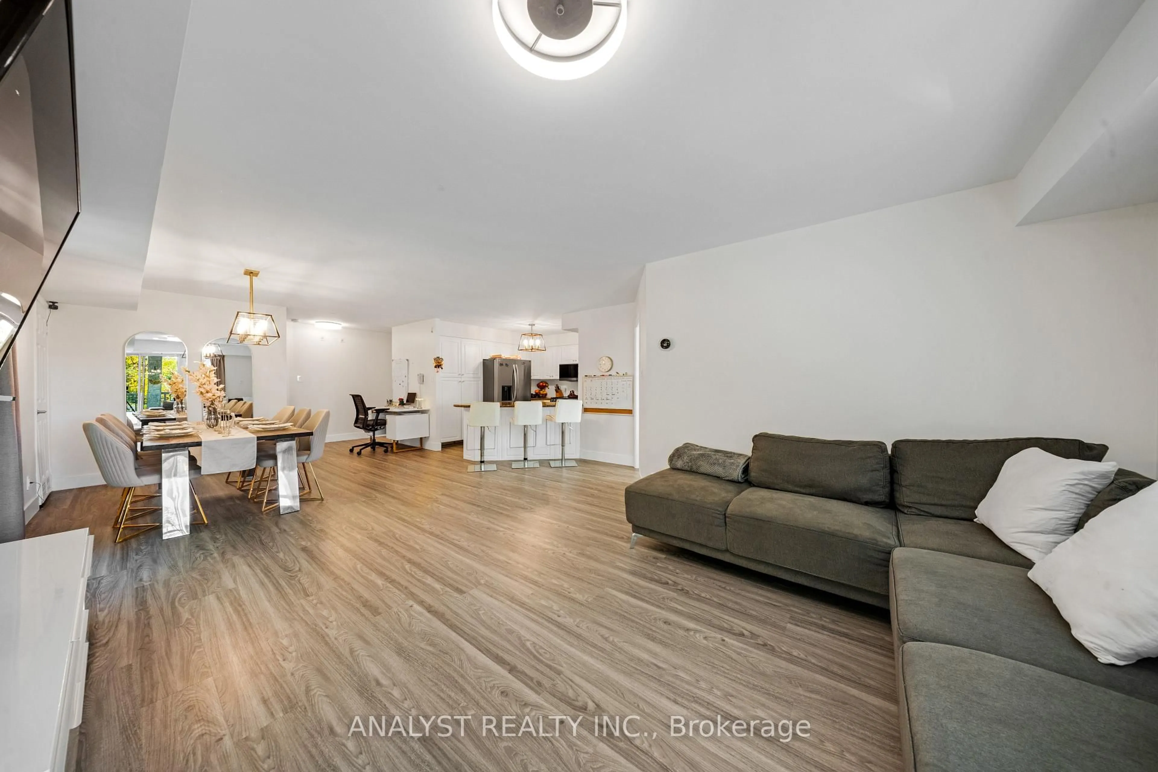 Living room with furniture, unknown for 245 Pine Grove Rd #107, Vaughan Ontario L4L 2H7