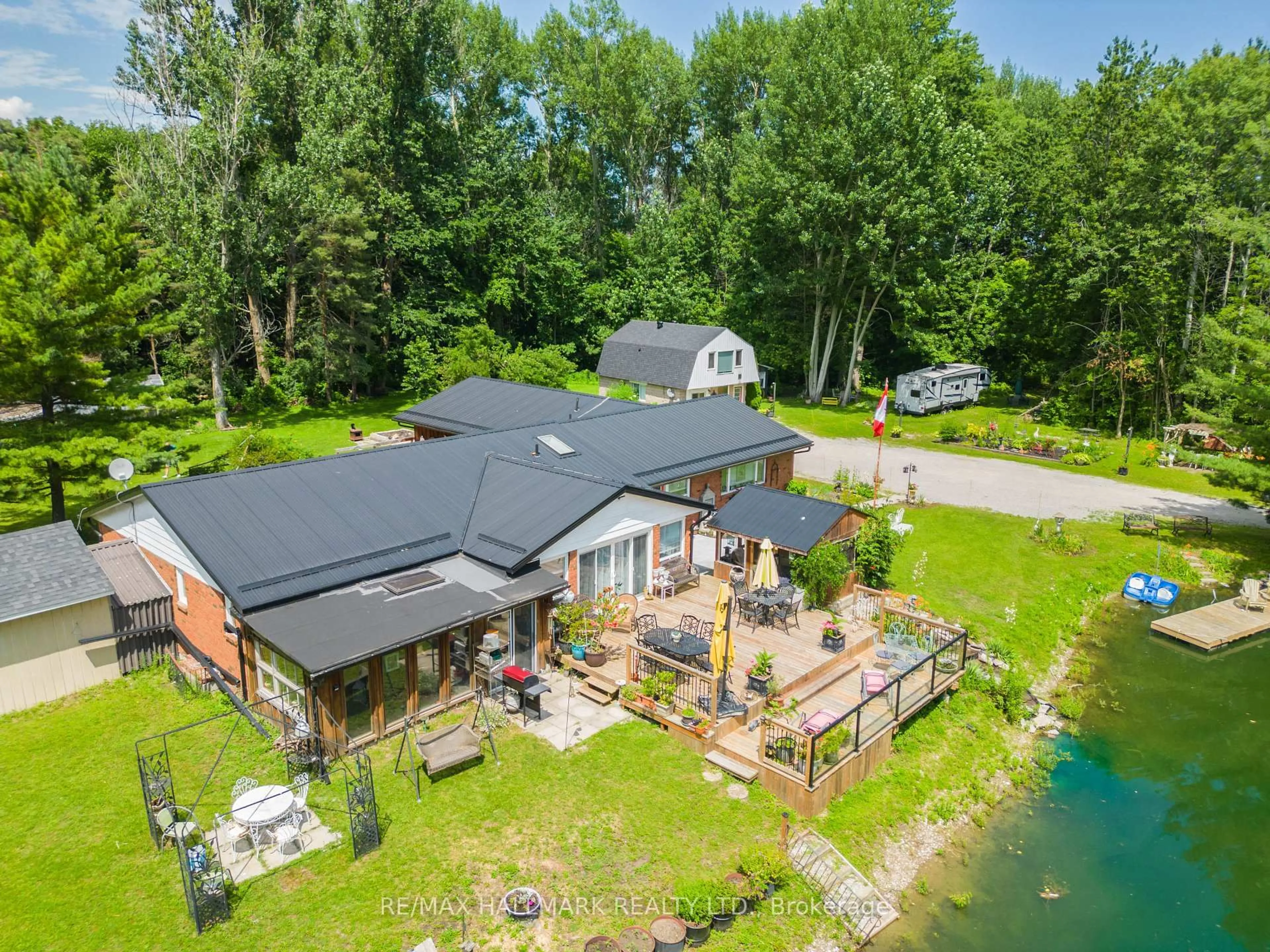 A pic from outside/outdoor area/front of a property/back of a property/a pic from drone, water/lake/river/ocean view for 1114 Goshen Rd, Innisfil Ontario L9S 2M5