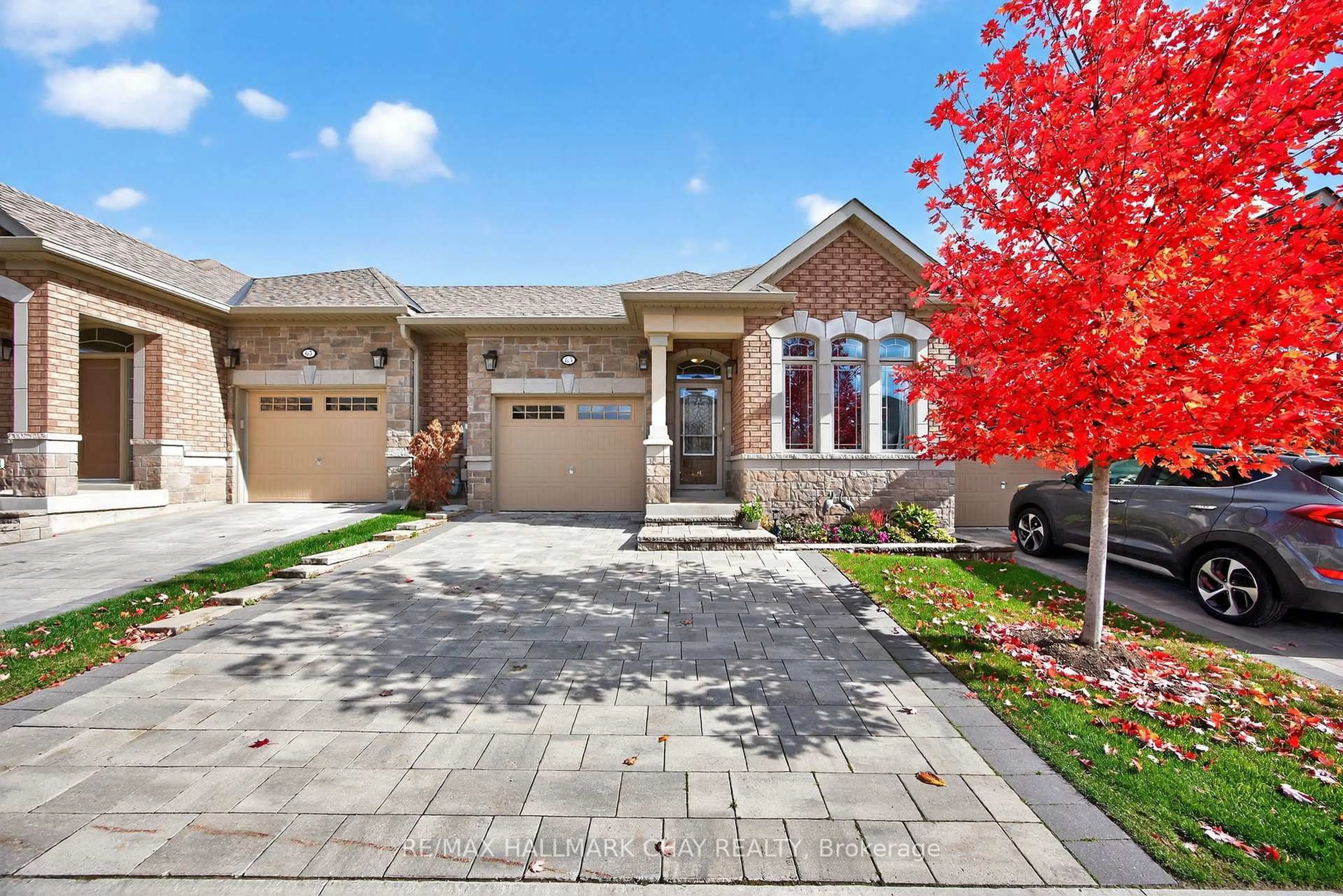 Home with brick exterior material, street for 63 Summerhill Dr, New Tecumseth Ontario L9R 0S8