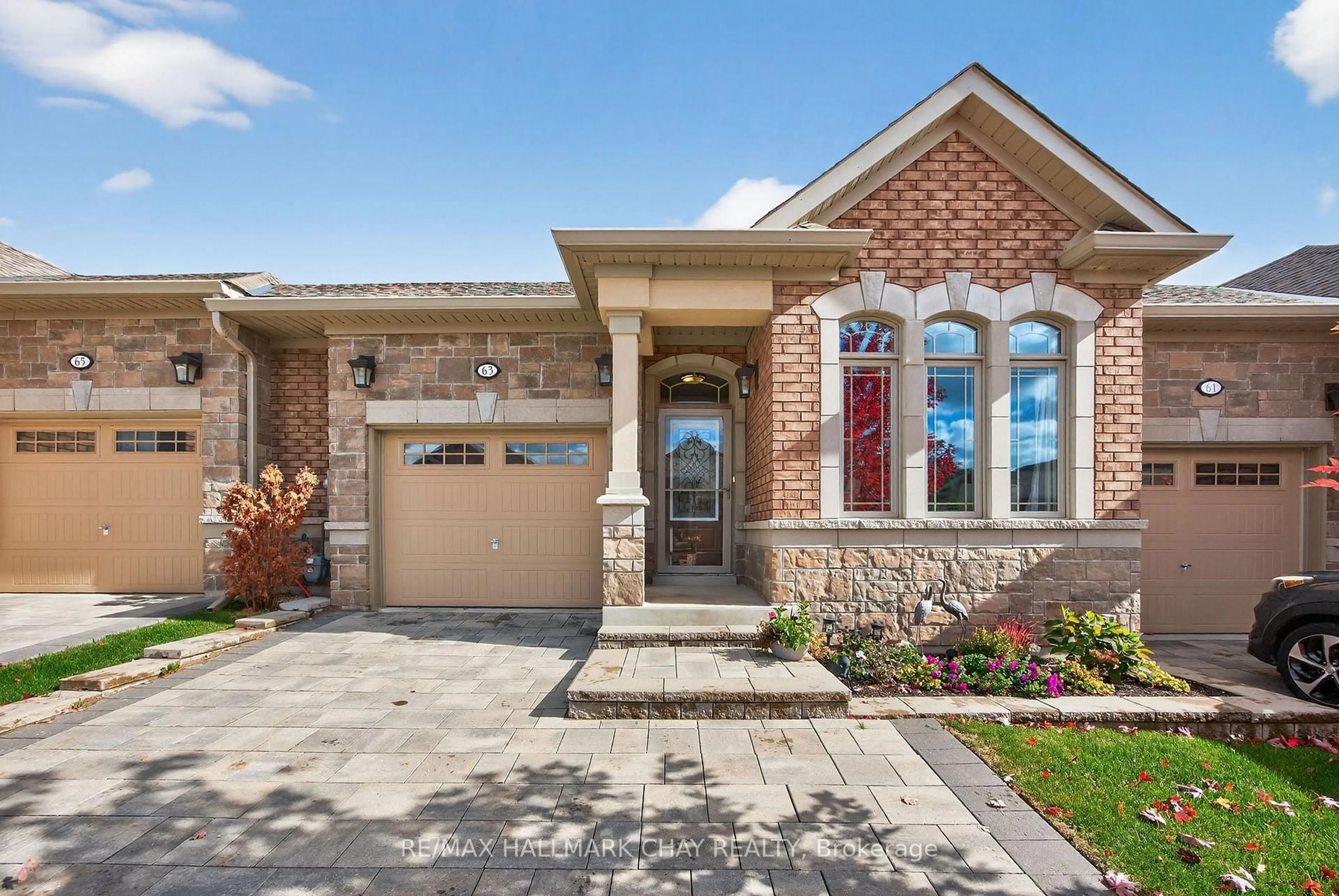 Home with brick exterior material, street for 63 Summerhill Dr, New Tecumseth Ontario L9R 0S8