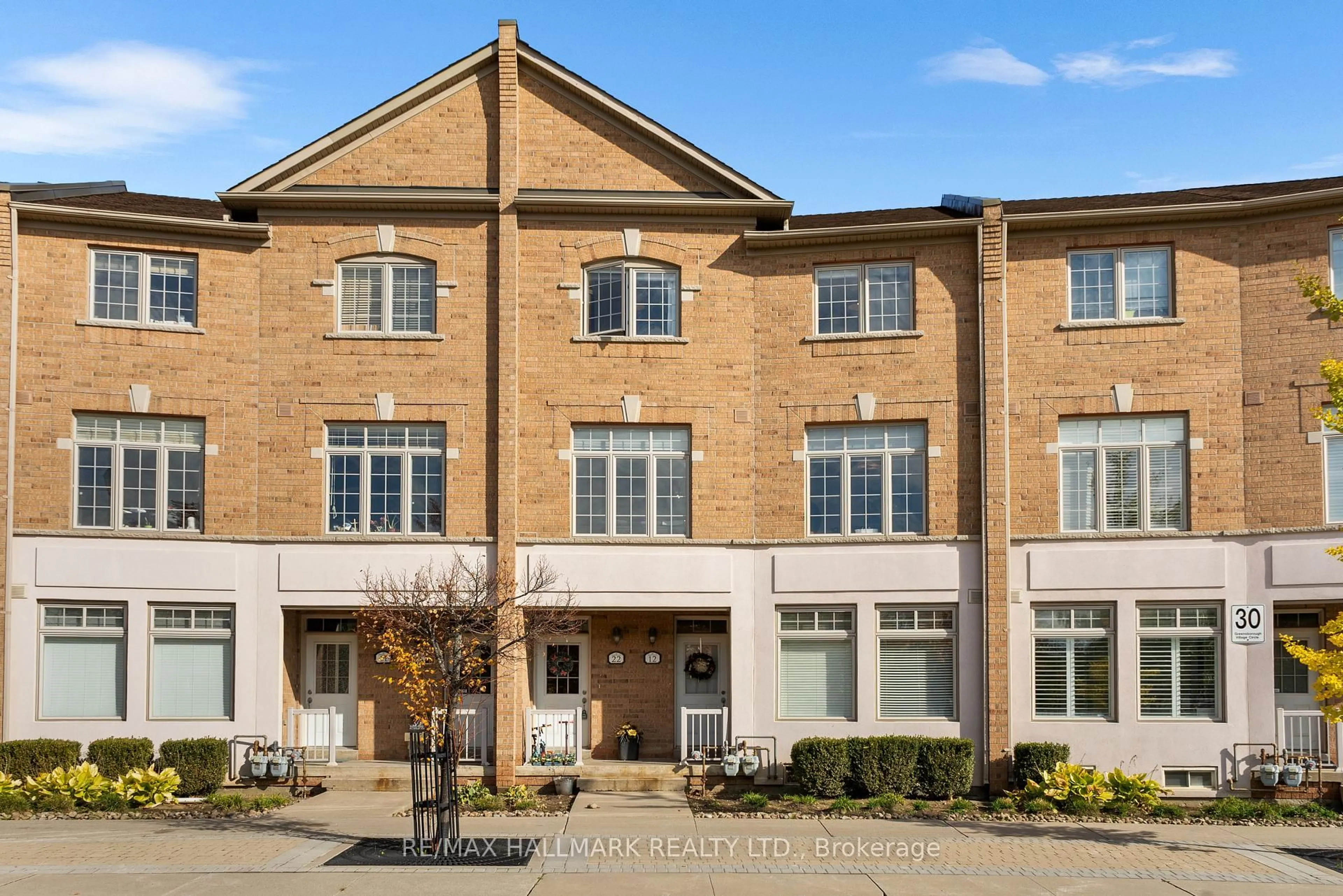 Home with brick exterior material, building for 30 Greensborough Village Circ #22, Markham Ontario L6E 1Z1