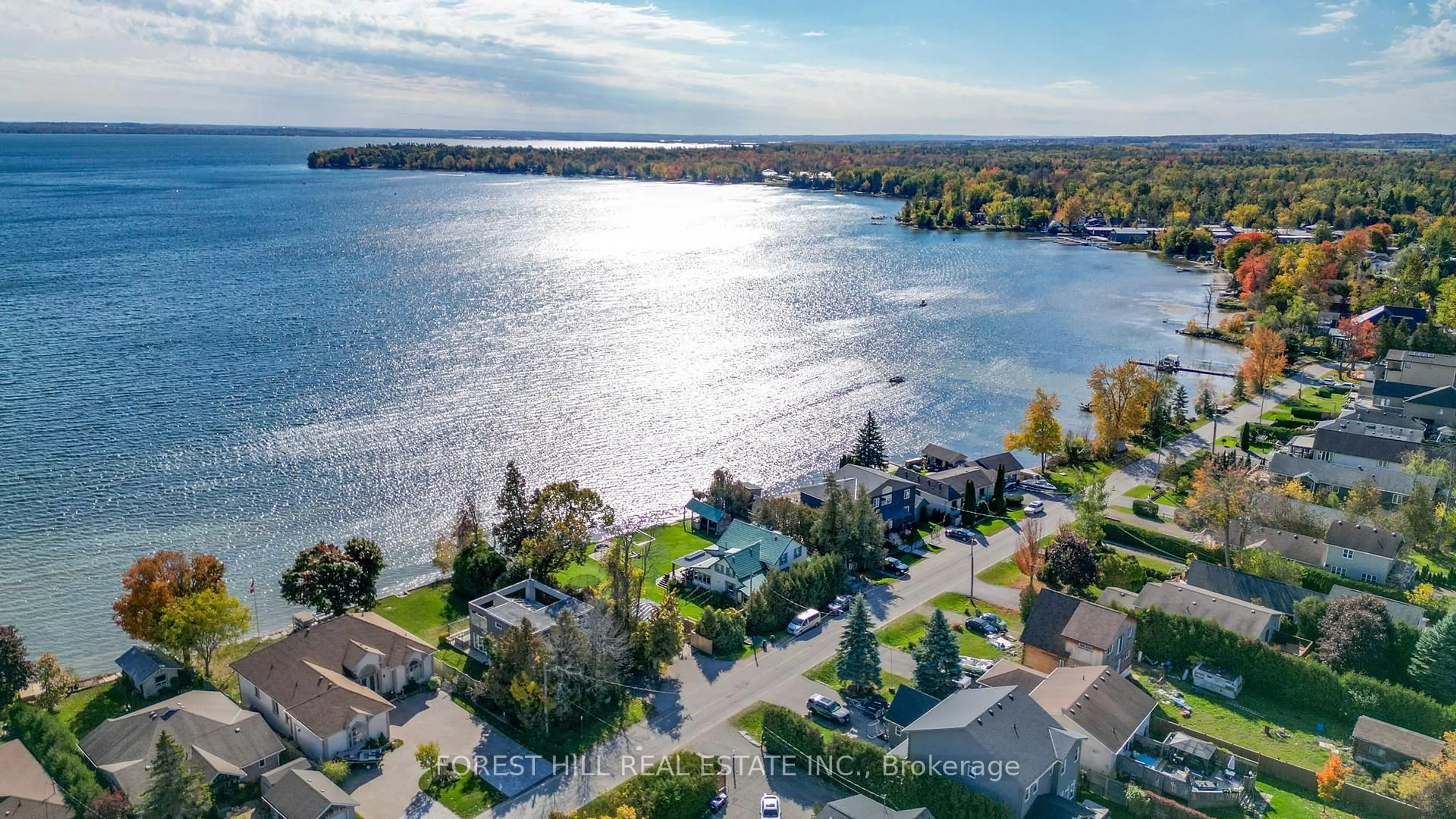 A pic from outside/outdoor area/front of a property/back of a property/a pic from drone, water/lake/river/ocean view for 1031 Wisker Ave, Innisfil Ontario L0L 1C0