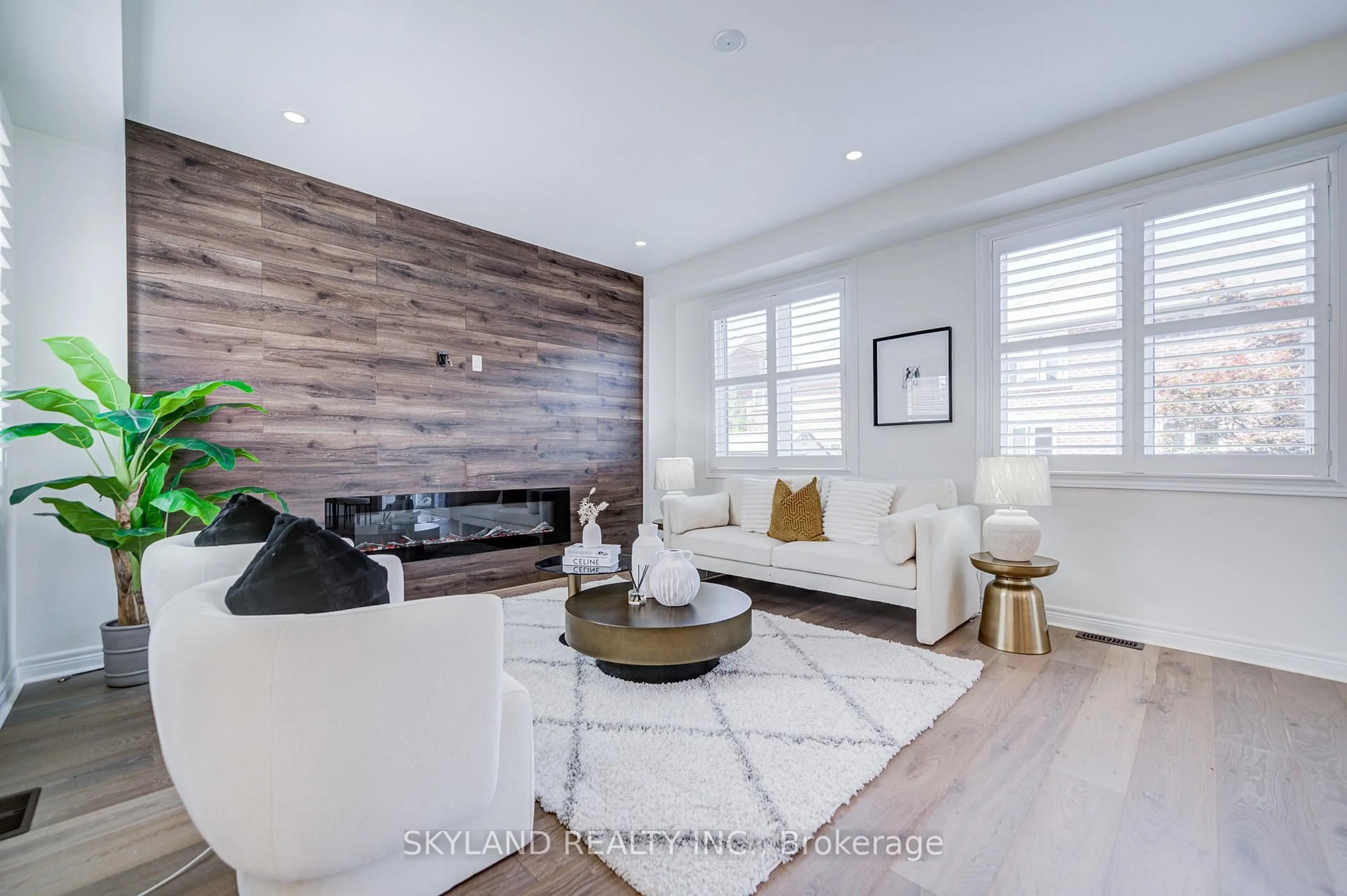 Living room with furniture, wood/laminate floor for 22 James Joyce Dr, Markham Ontario L6C 0L7