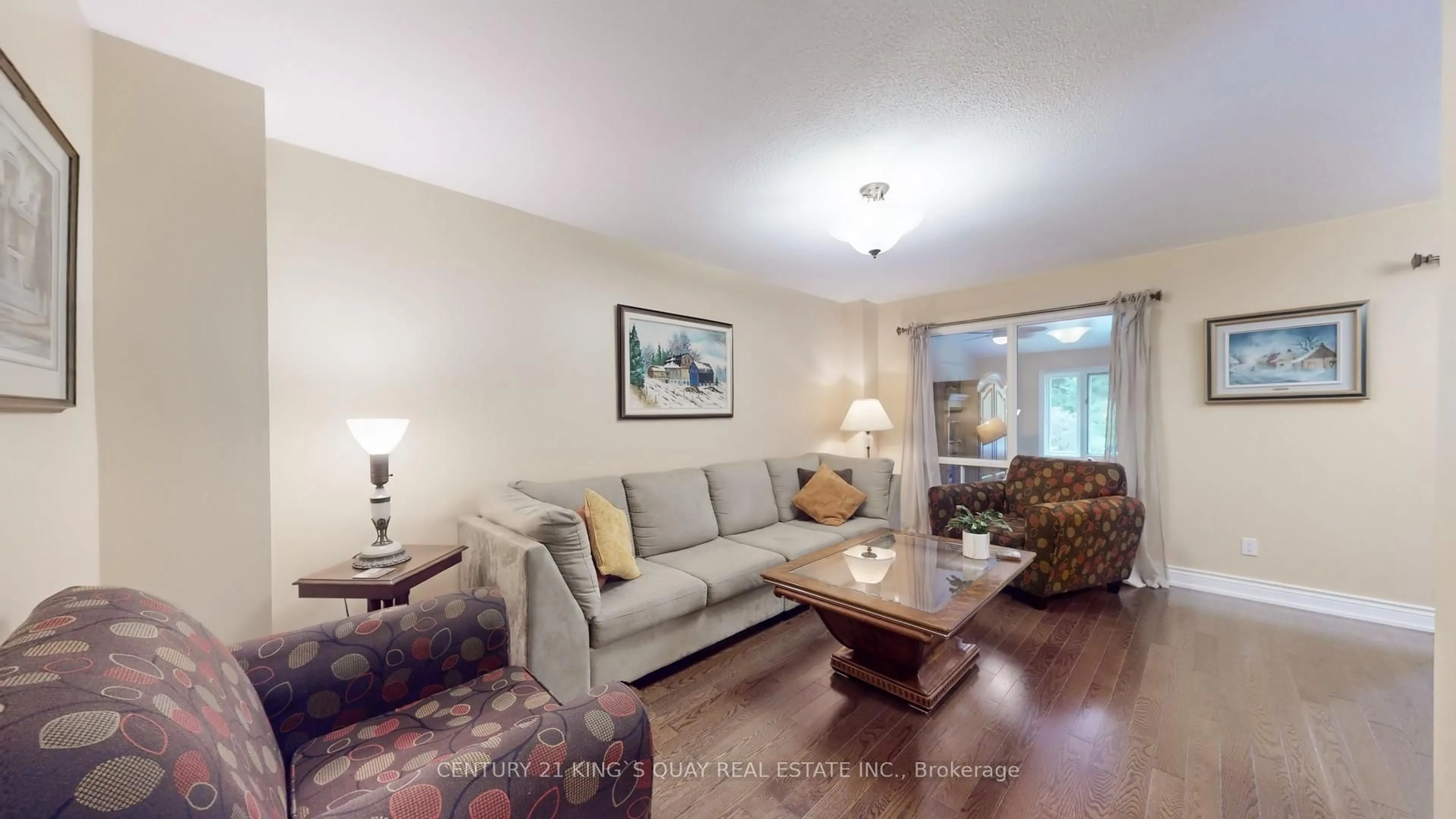 Living room with furniture, wood/laminate floor for 47 Radford Cres, Markham Ontario L3P 4A2