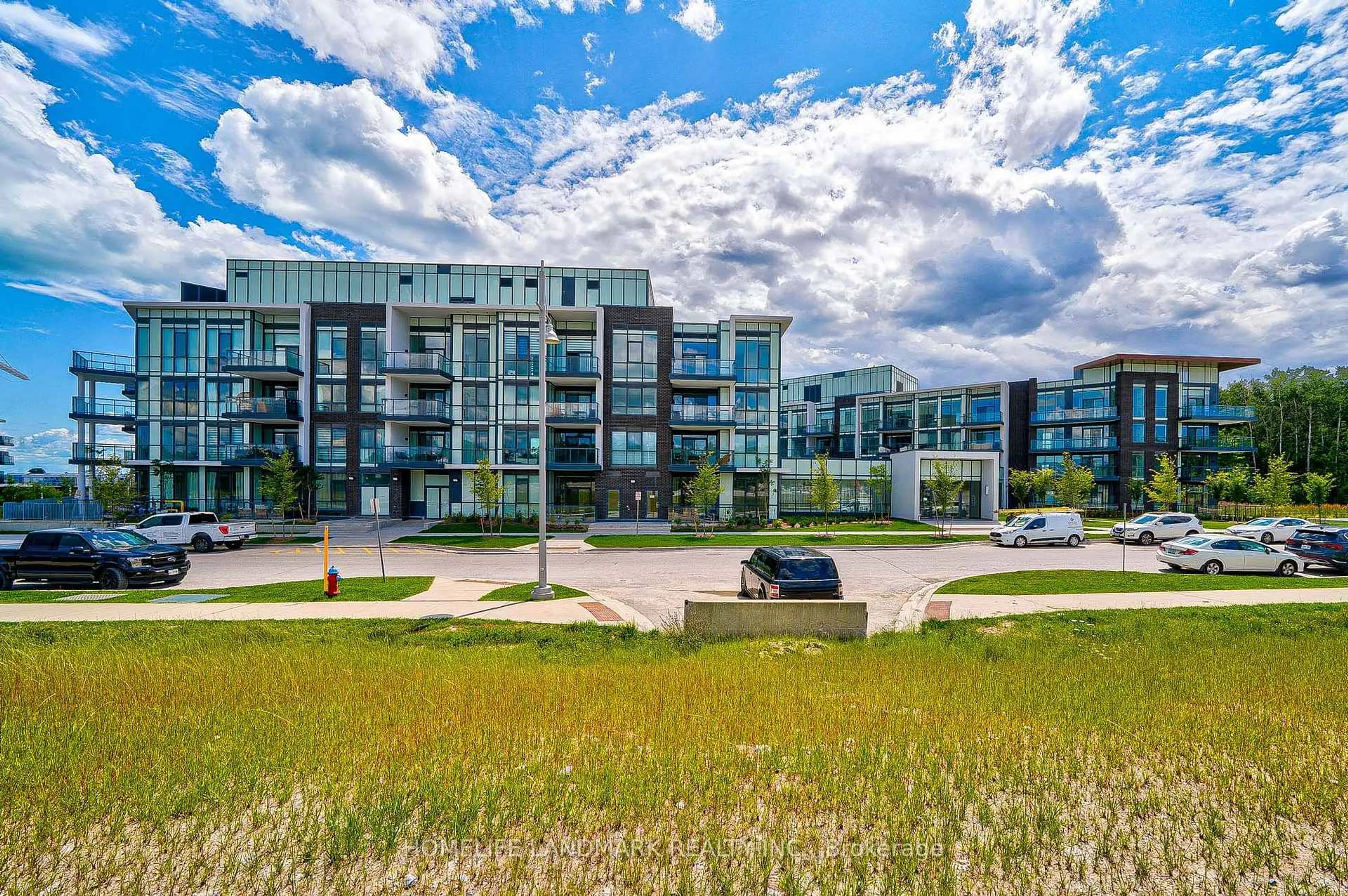 A pic from outside/outdoor area/front of a property/back of a property/a pic from drone, water/lake/river/ocean view for 415 Sea Ray Ave #312, Innisfil Ontario L9S 0R5