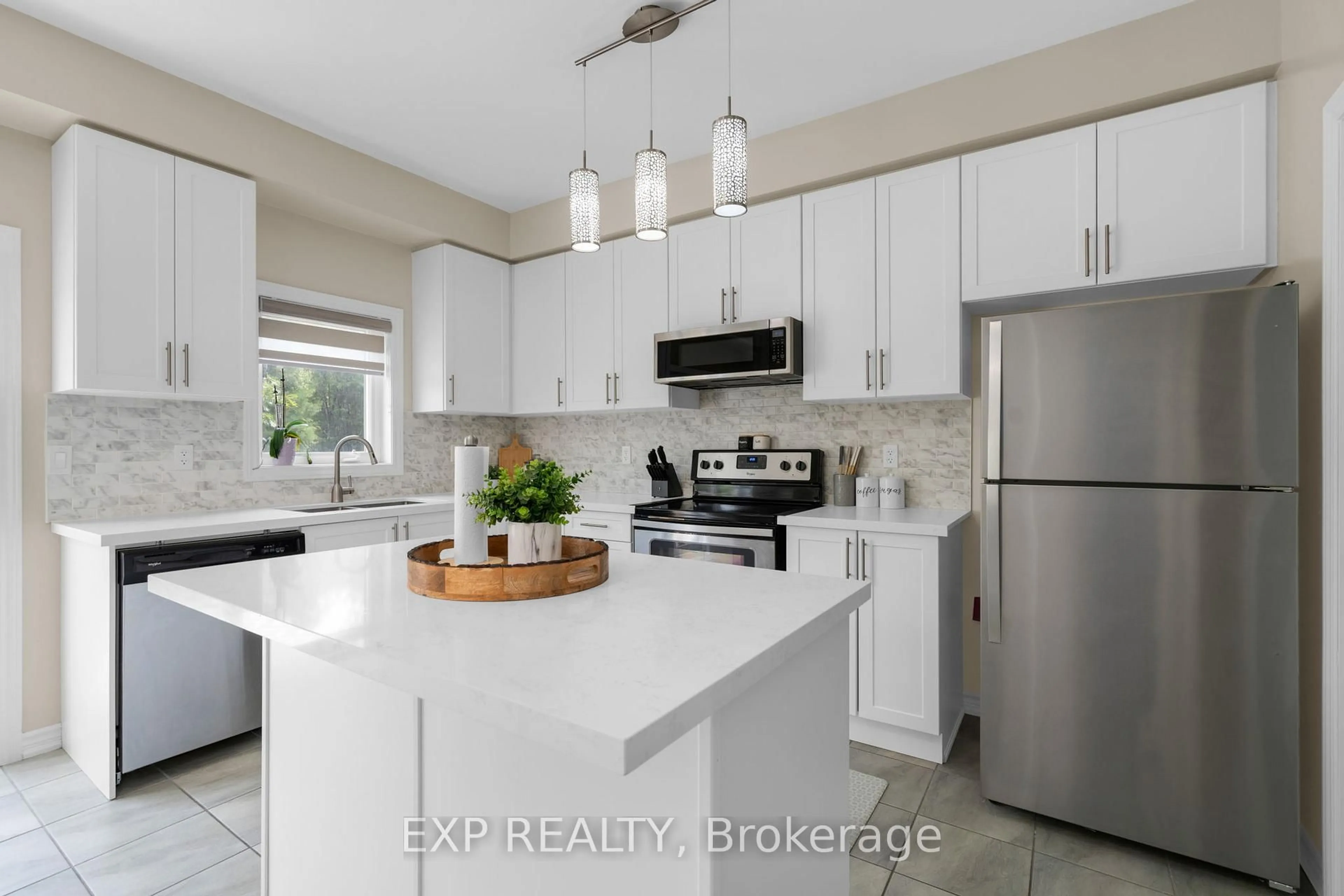 Open concept kitchen, ceramic/tile floor for 57 Milson Cres, Essa Ontario L3W 0C9