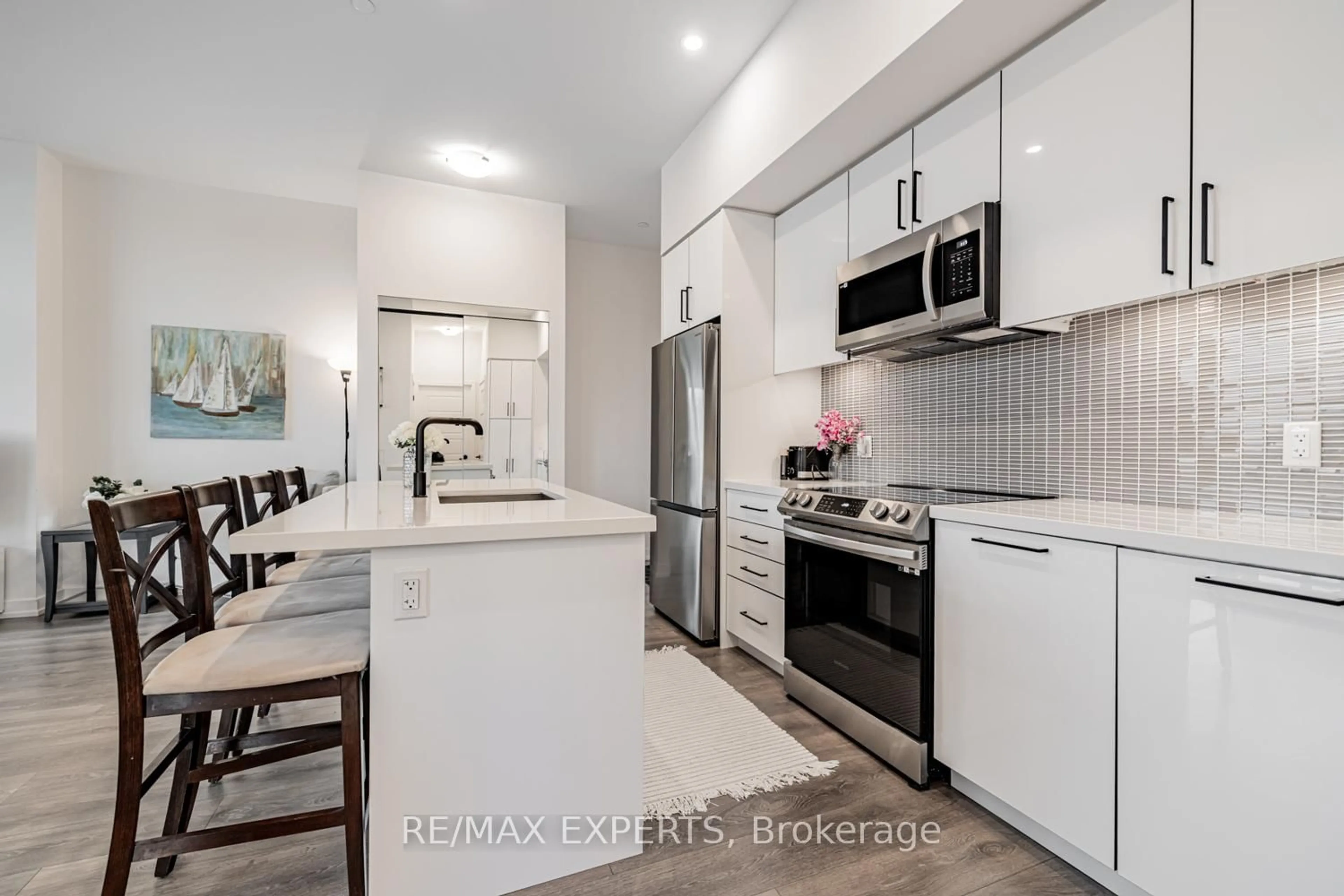 Open concept kitchen, ceramic/tile floor for 415 Sea Ray Ave #105, Innisfil Ontario L9S 0R5
