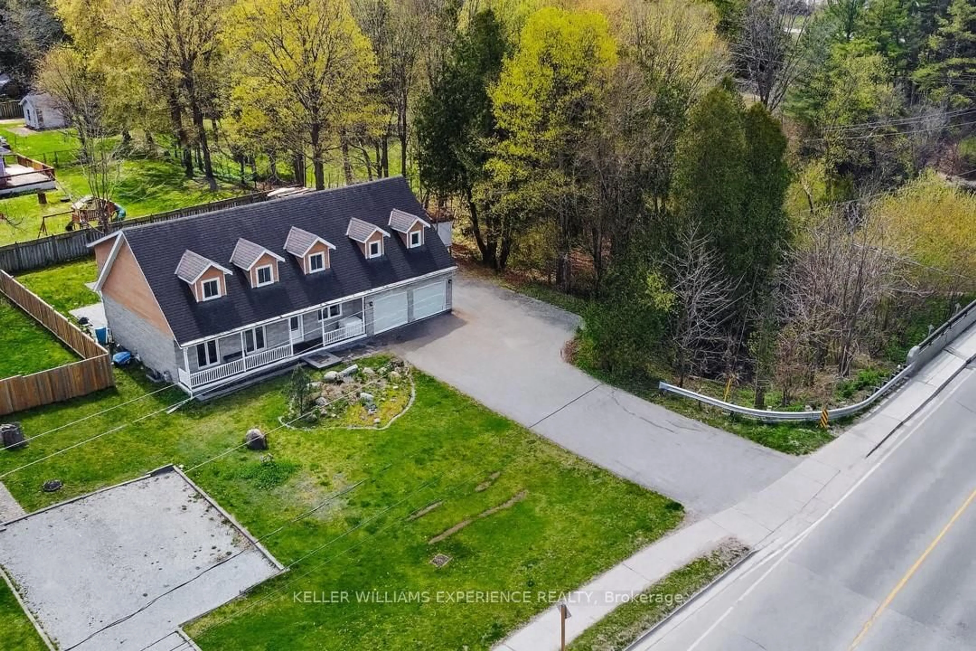 A pic from outside/outdoor area/front of a property/back of a property/a pic from drone, street for 190 Centre St, Essa Ontario L0M 1B0