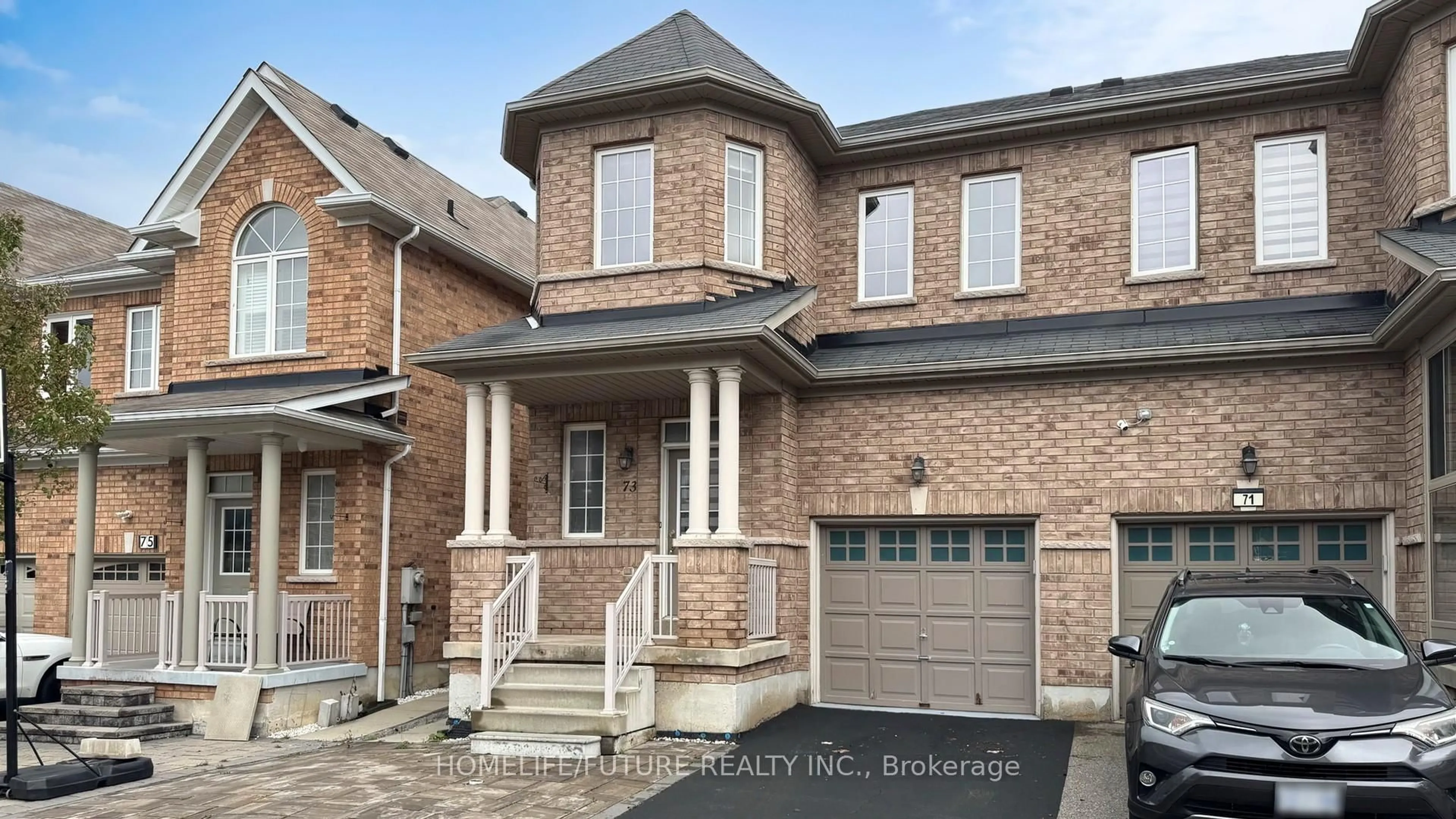 Home with brick exterior material, street for 73 Coleluke Lane, Markham Ontario L3S 0B8