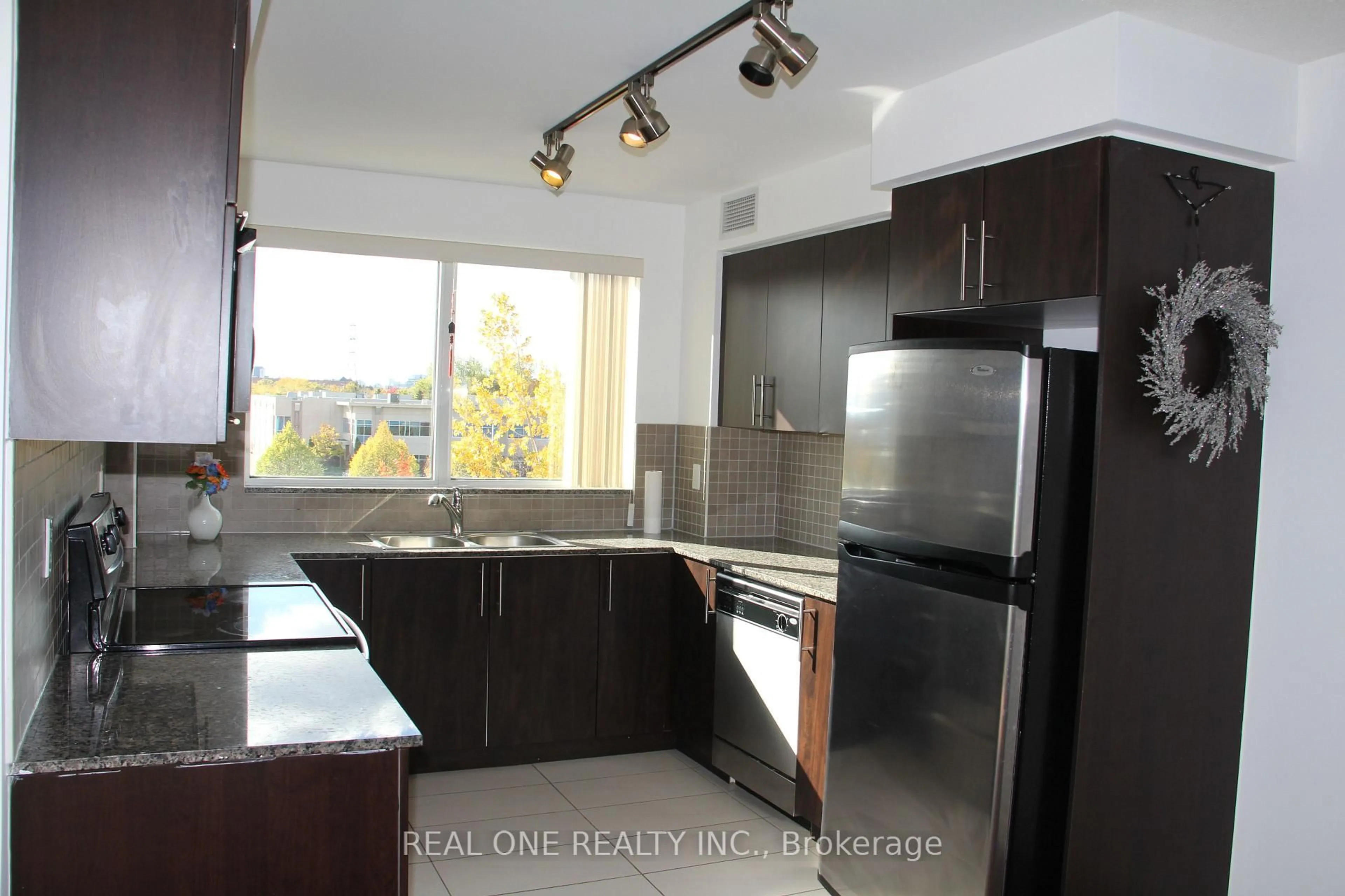 Standard kitchen, wood/laminate floor for 50 Clegg Rd #319, Markham Ontario L6G 0C6