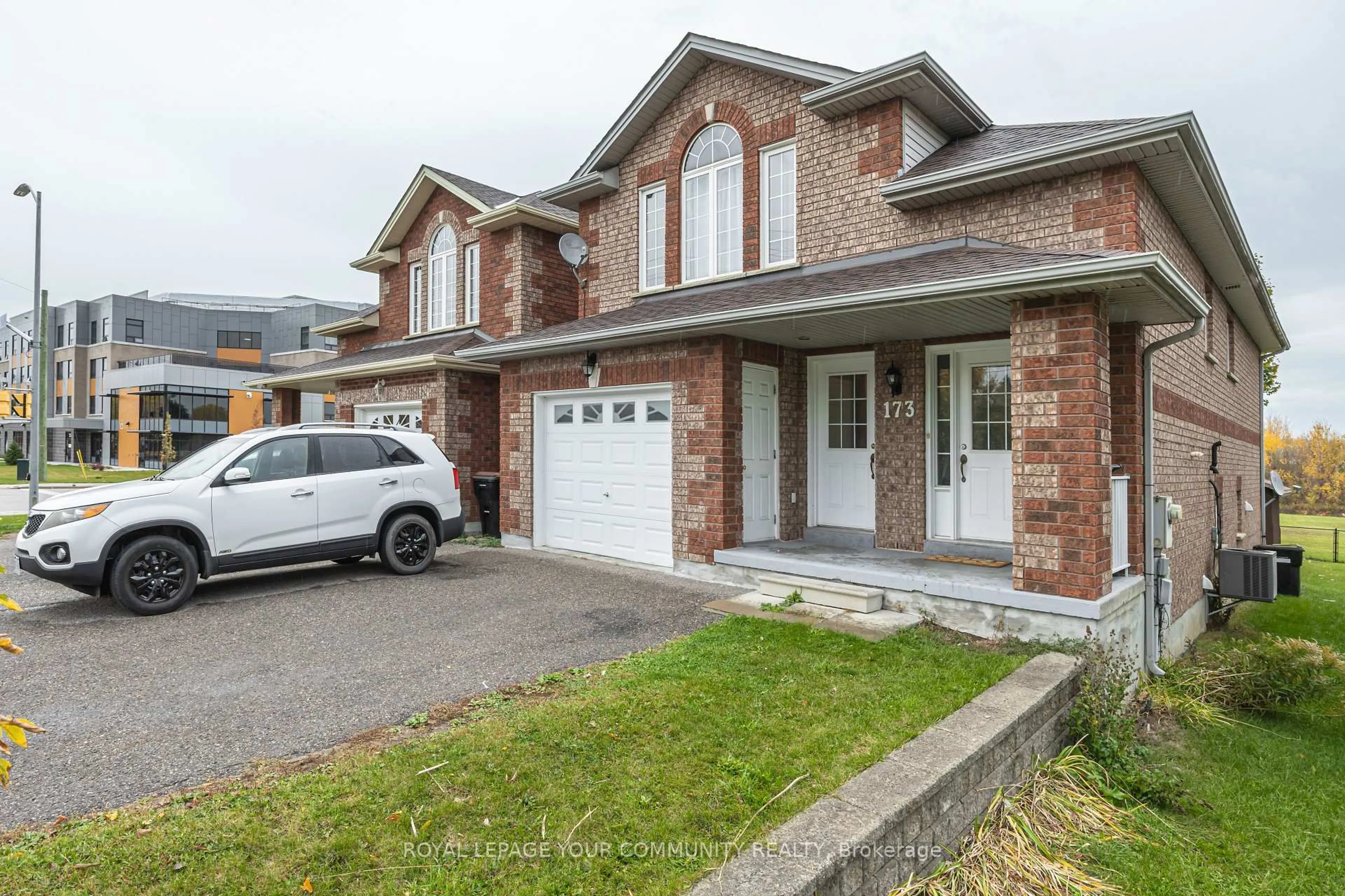 Home with brick exterior material, street for 173 Simcoe Rd, Bradford West Gwillimbury Ontario L3Z 1Y3