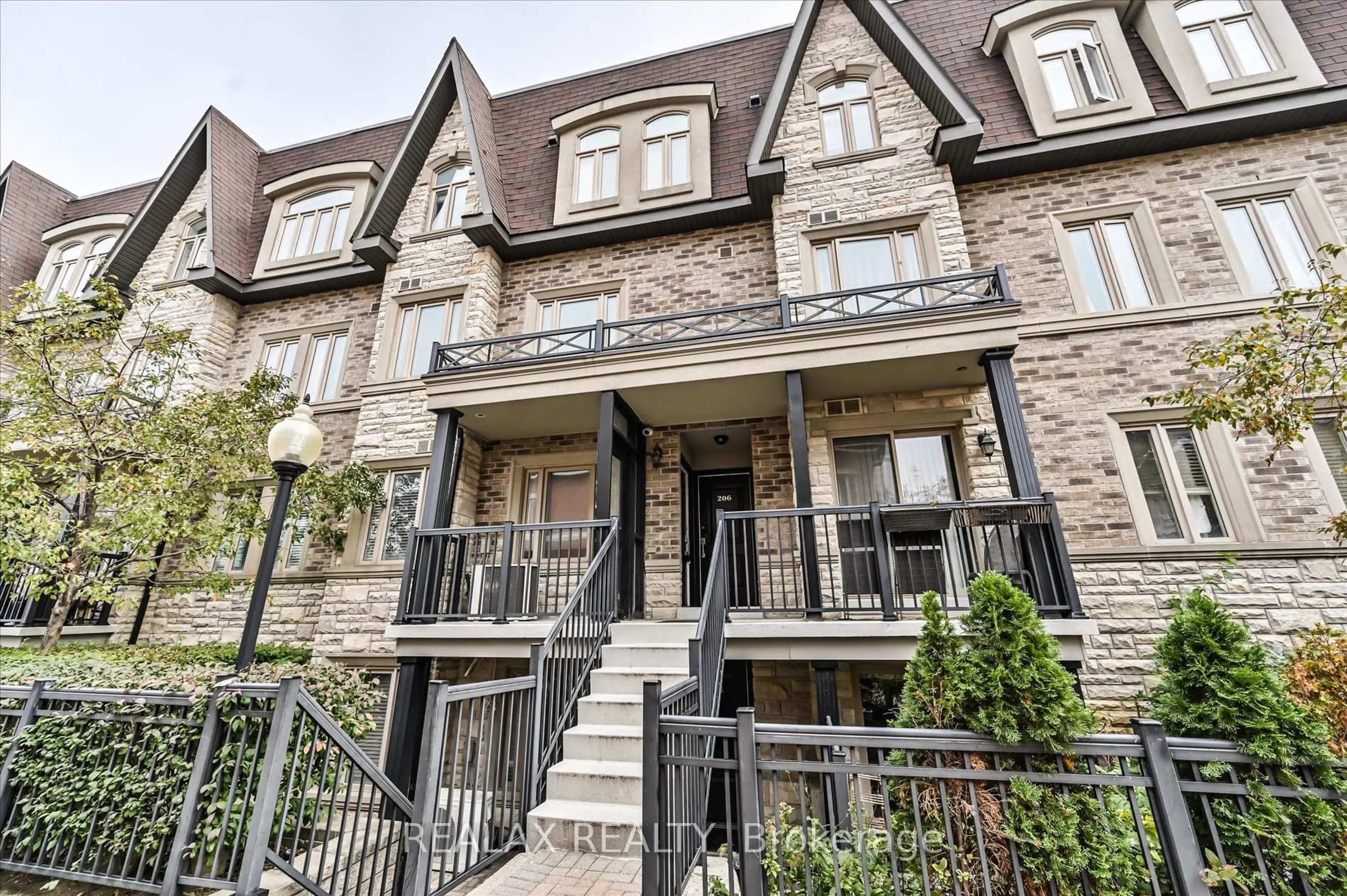 Home with brick exterior material, street for 320 John St #207, Markham Ontario L3T 0B1