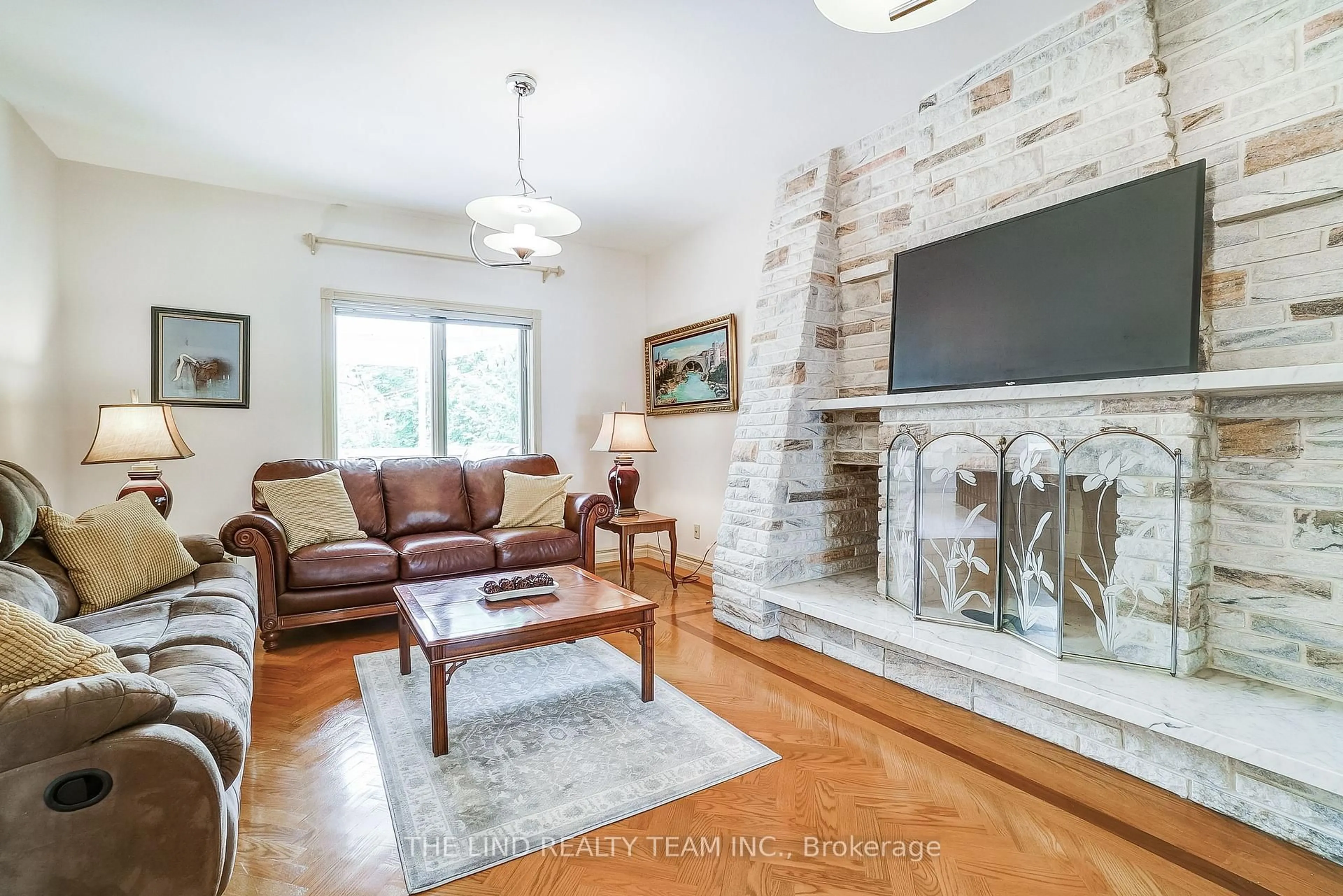 Living room with furniture, wood/laminate floor for 99 Birch Ave, Richmond Hill Ontario L4C 6C5