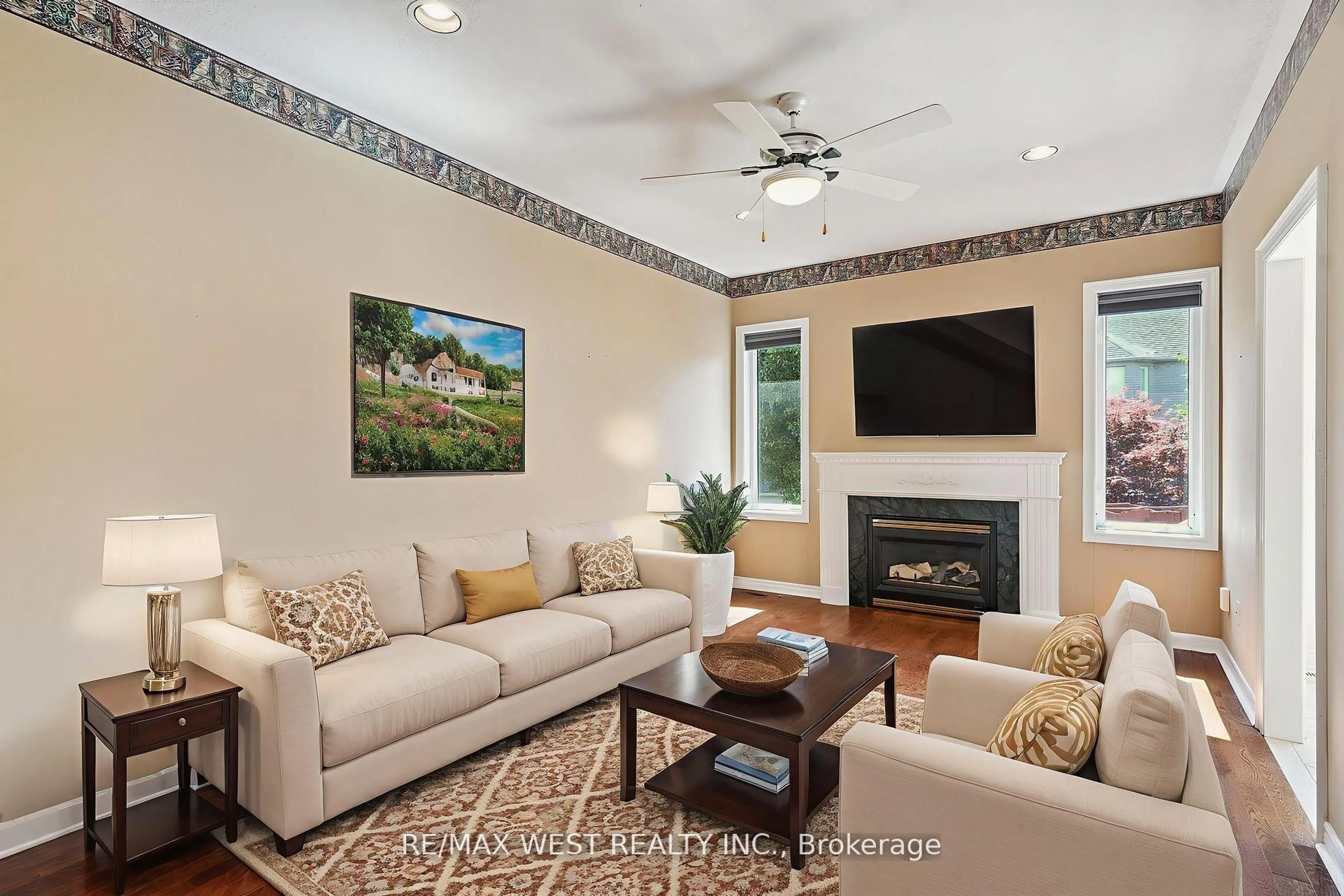 Living room with furniture, ceramic/tile floor for 42 Windrose Crt, Vaughan Ontario L4L 9G9