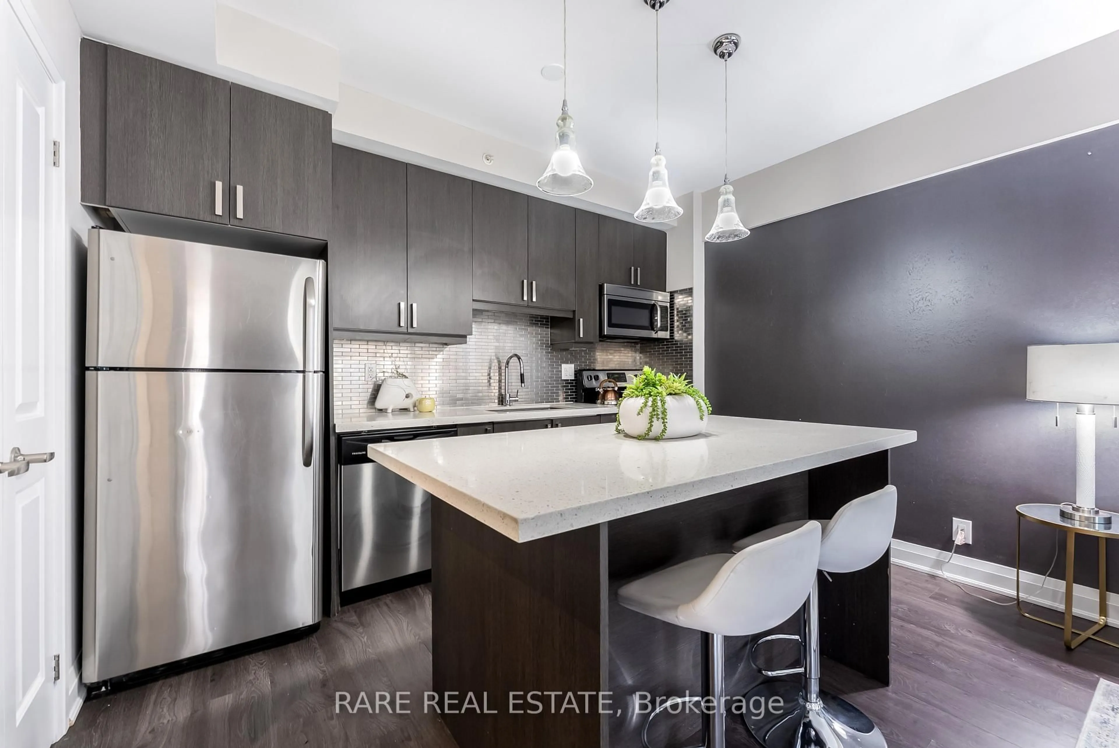 Open concept kitchen, wood/laminate floor for 24 WOODSTREAM Blvd #118, Vaughan Ontario L4L 8C4