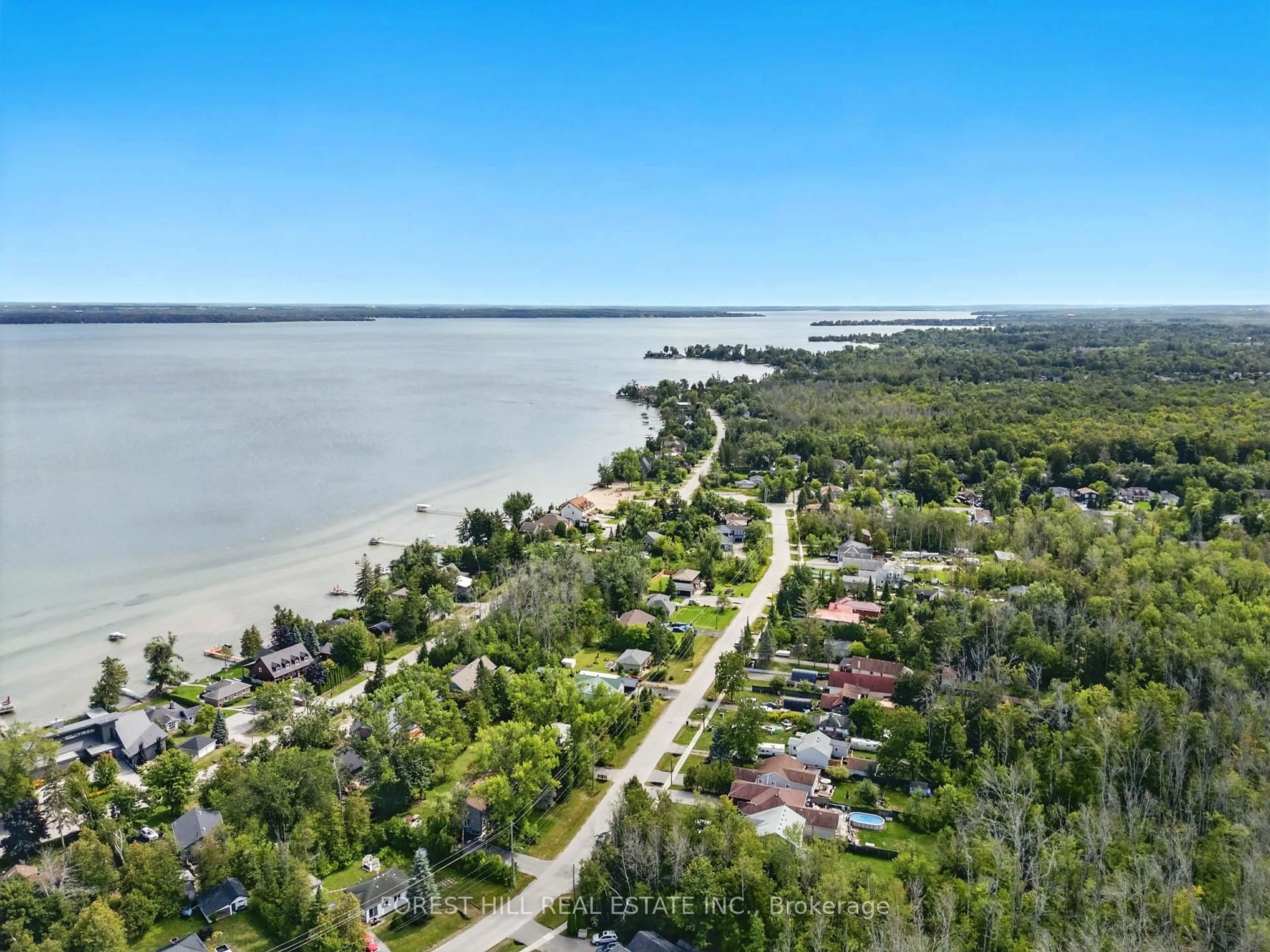 A pic from outside/outdoor area/front of a property/back of a property/a pic from drone, water/lake/river/ocean view for 742 Trumbley Pl #742, Innisfil Ontario L9S 0S1