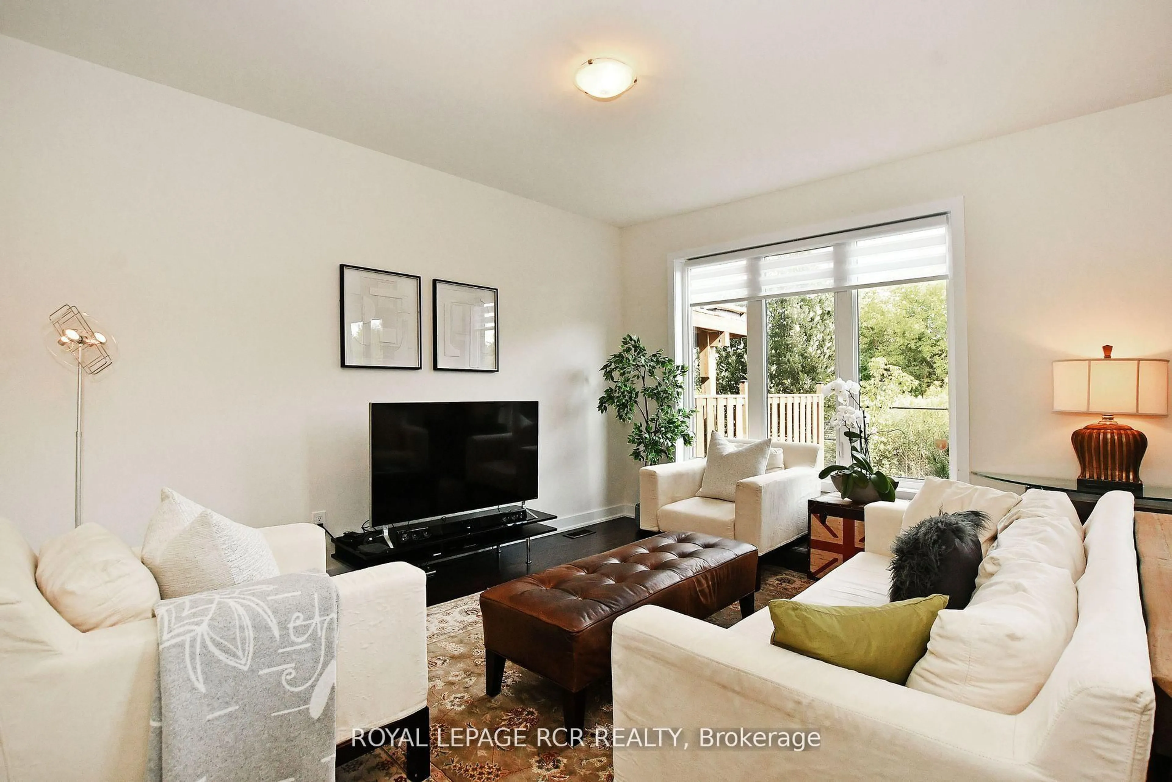 Living room with furniture, wood/laminate floor for 65 Anchusa Dr, Richmond Hill Ontario L4E 1C6