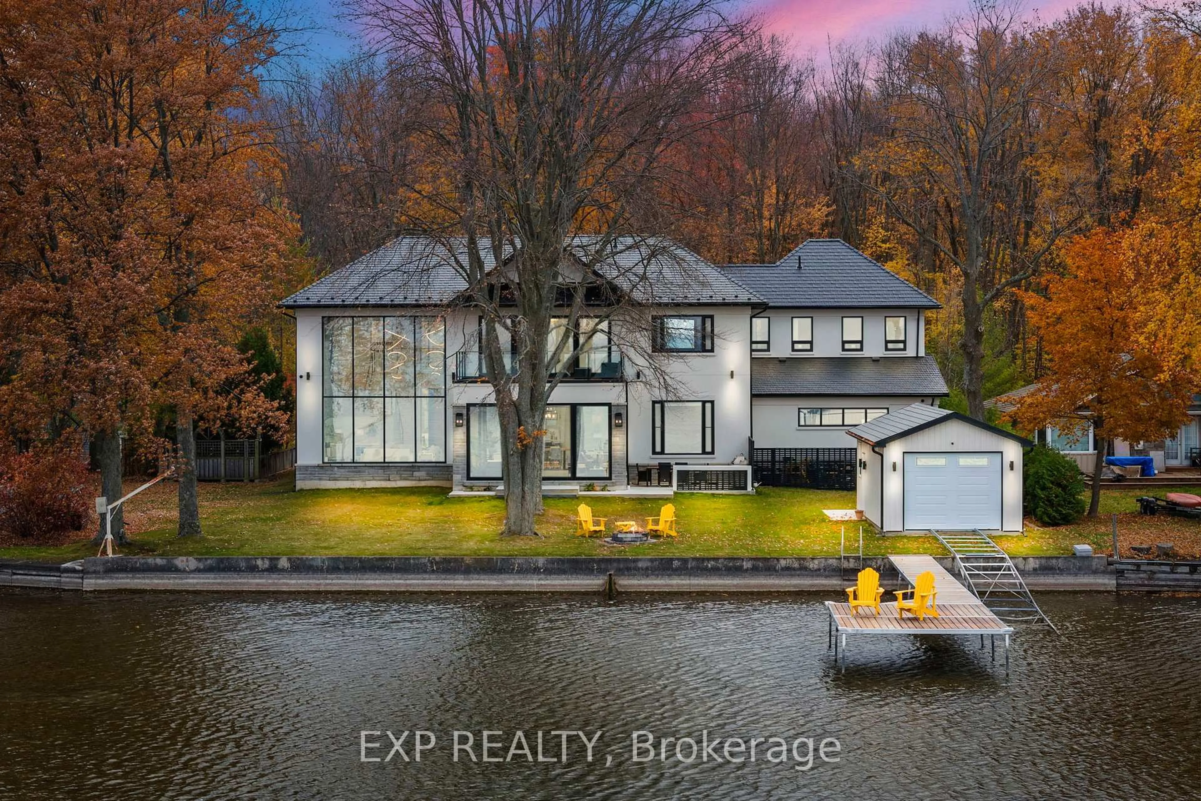 A pic from outside/outdoor area/front of a property/back of a property/a pic from drone, water/lake/river/ocean view for 98 Mcrae Beach Rd, Georgina Ontario L0E 1N0