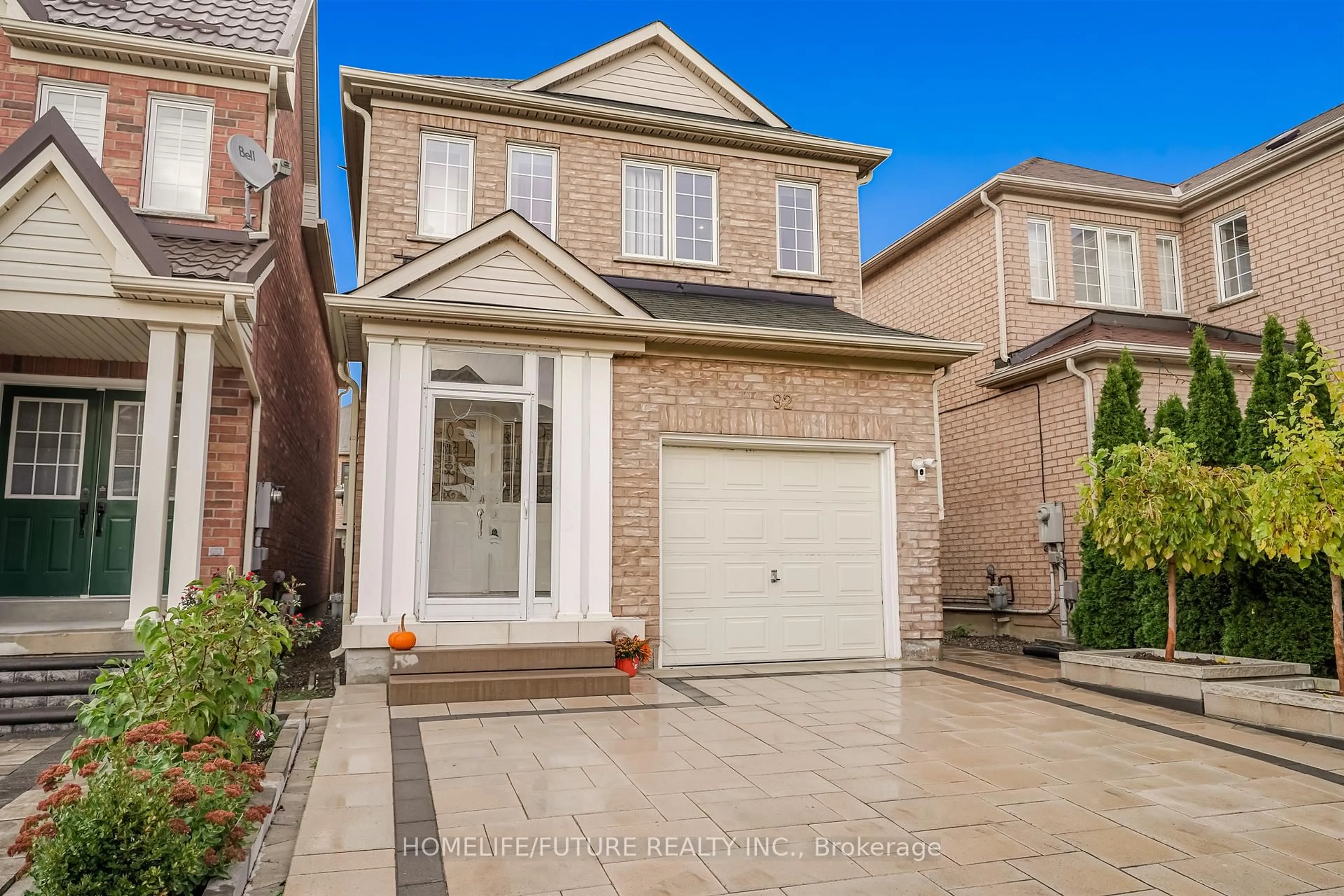 Home with brick exterior material, street for 92 Jack Monkman Cres, Markham Ontario L3S 0A4