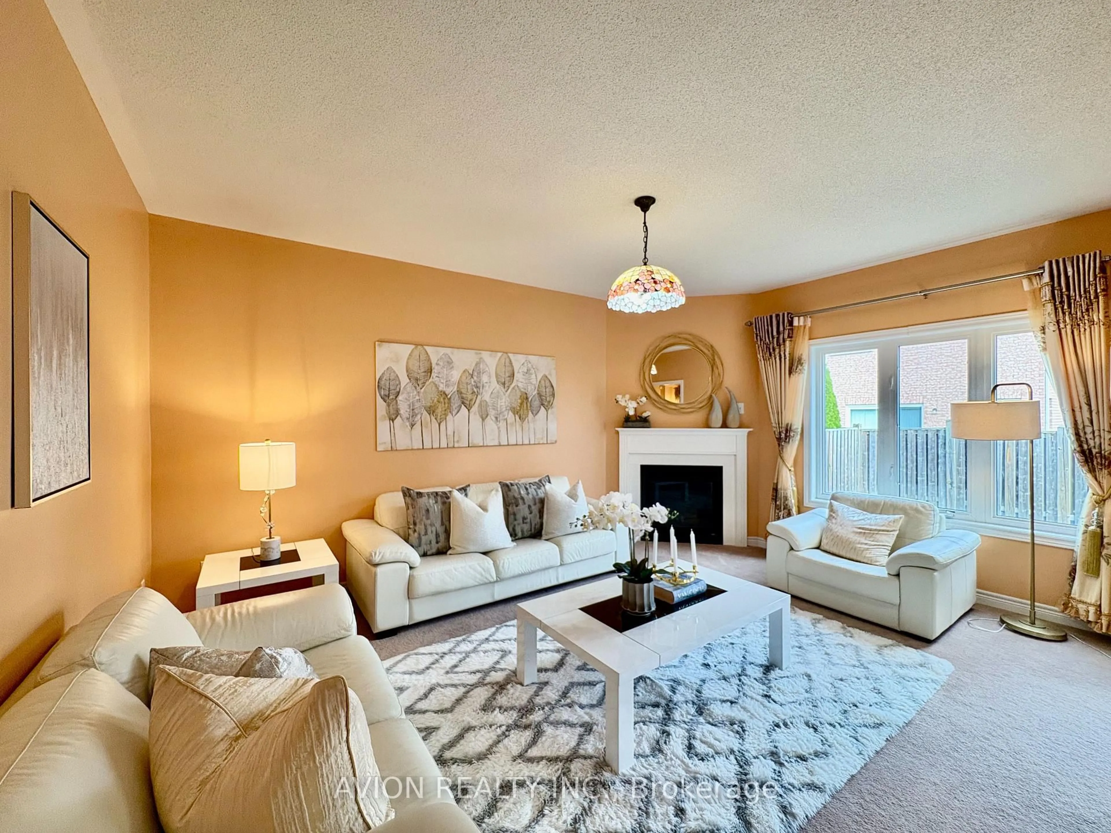 Living room with furniture, carpet floor for 9 Outerbrook Rd, Markham Ontario L6E 1Y8