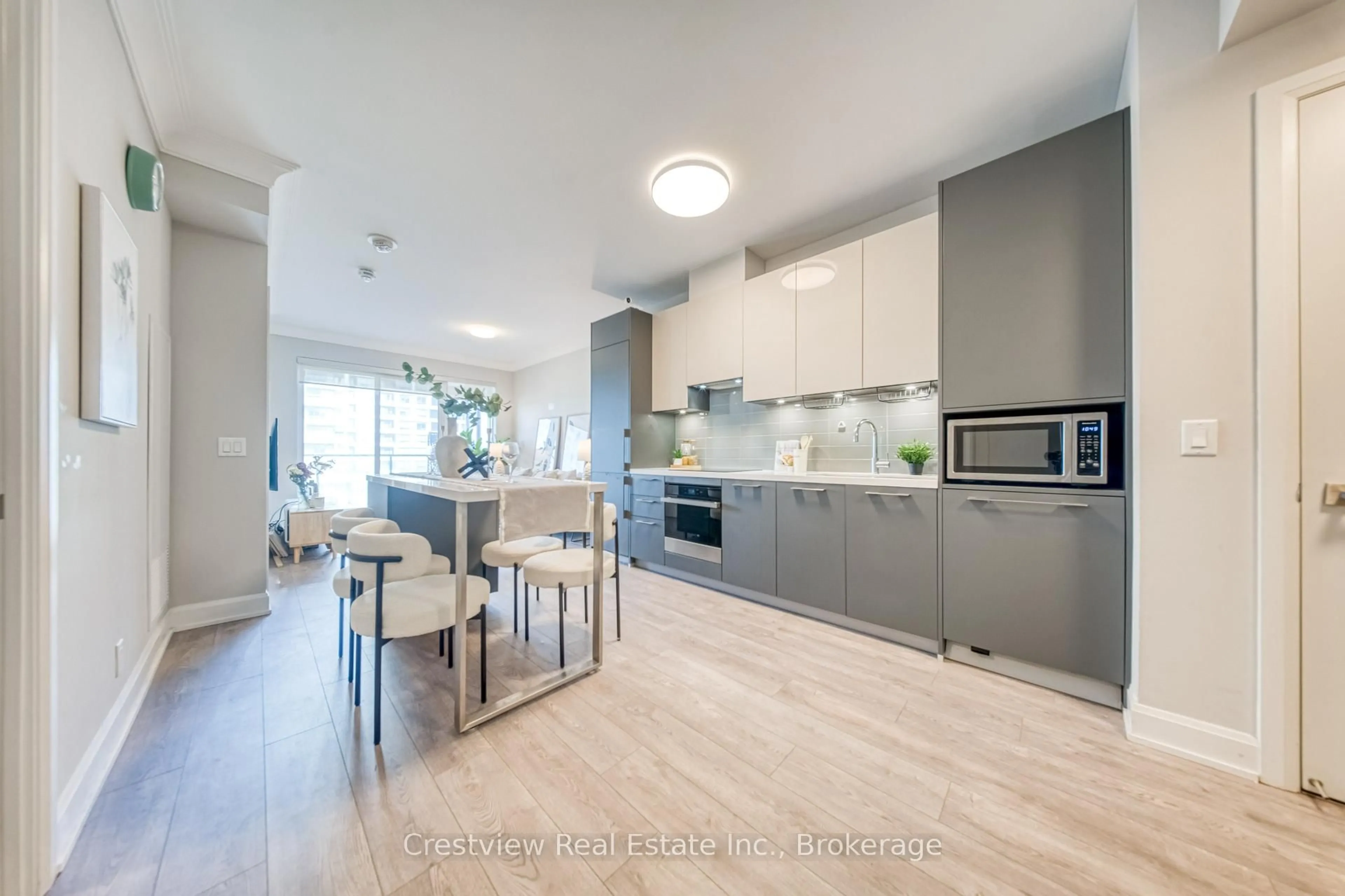 Contemporary kitchen, wood/laminate floor for 8 Water Walk Dr #309, Markham Ontario L3R 6L4