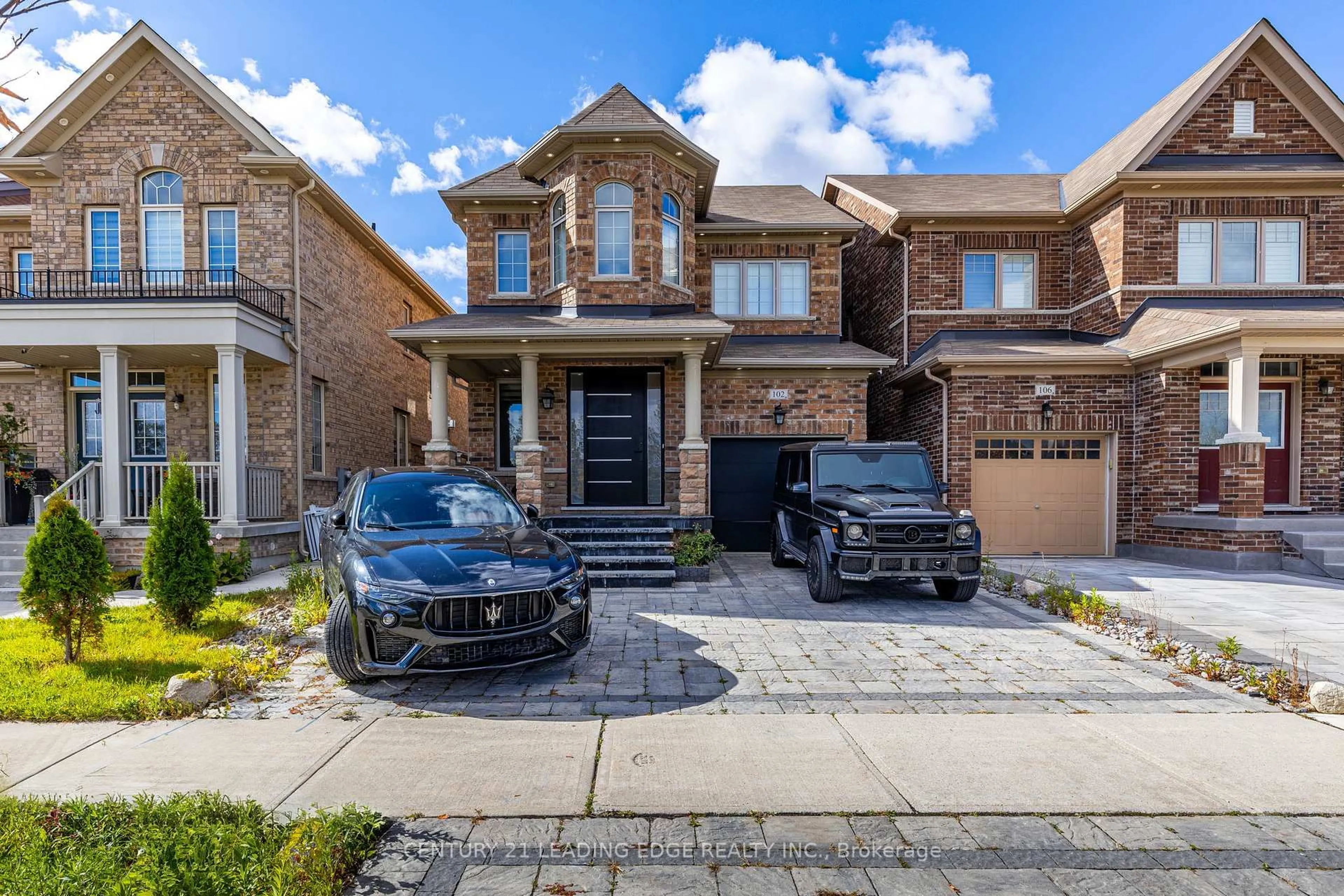 Home with brick exterior material, street for 102 MACTIER Dr, Vaughan Ontario L4H 4T9