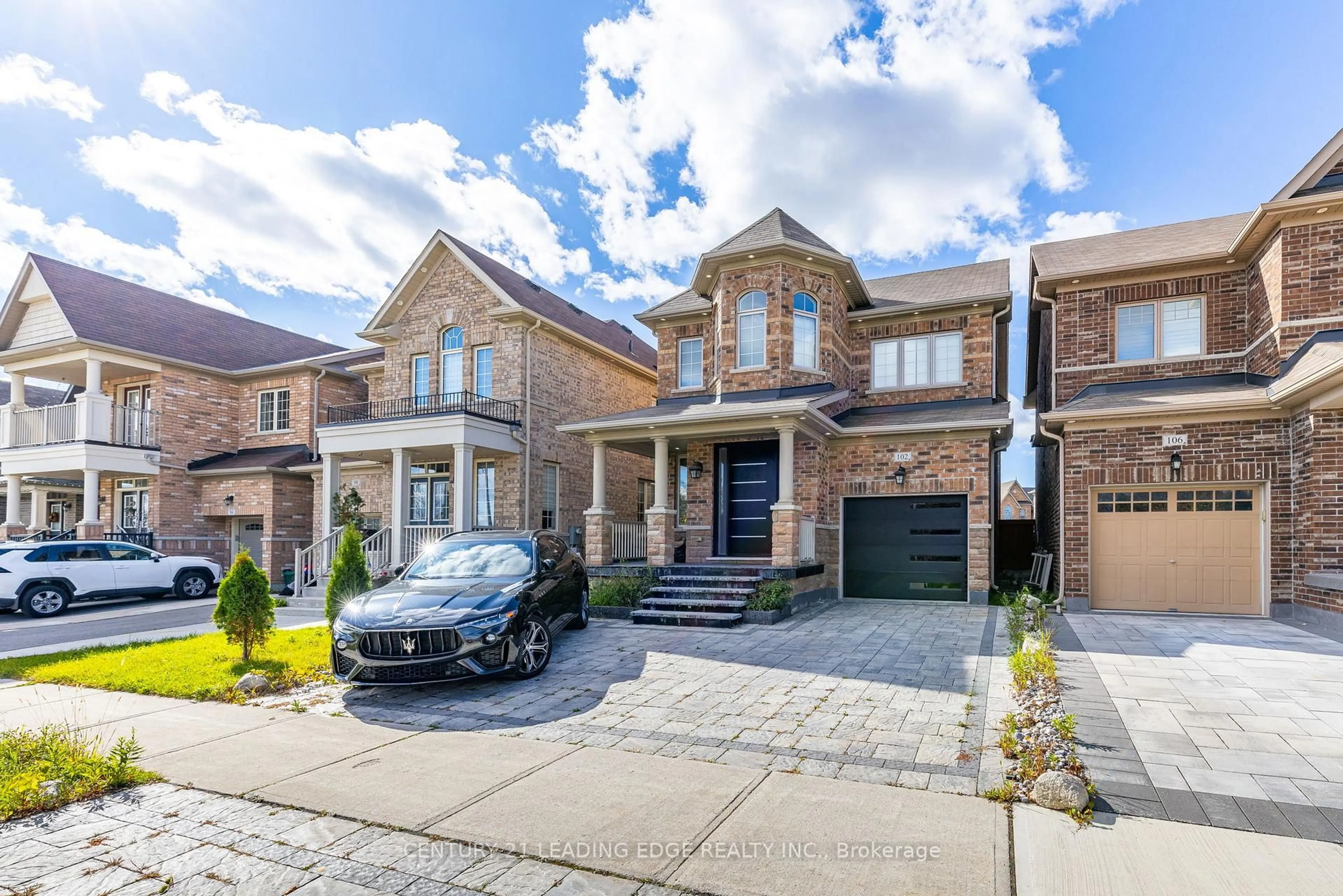 Home with brick exterior material, street for 102 MACTIER Dr, Vaughan Ontario L4H 4T9