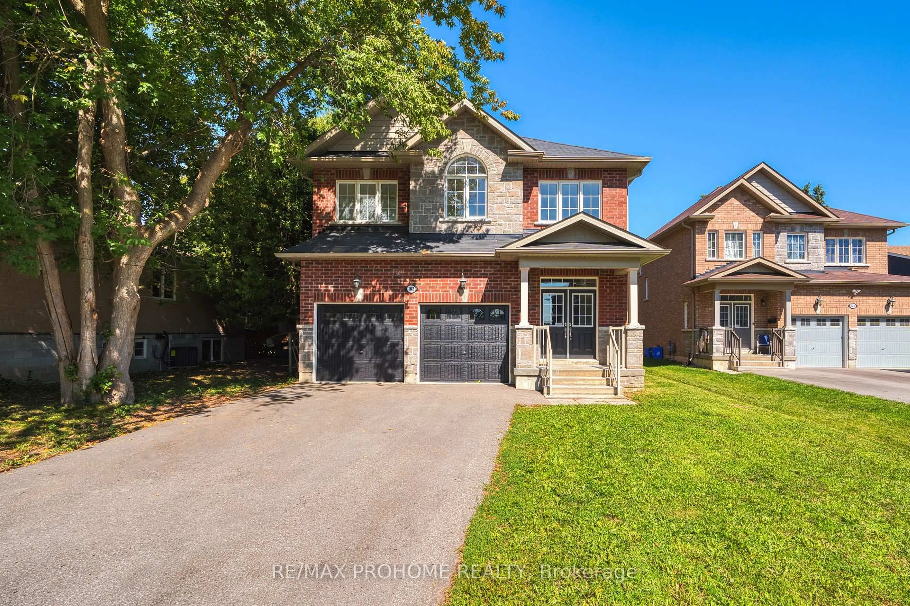 Home with brick exterior material, street for 102 Riveredge Dr, Georgina Ontario L4P 2P1