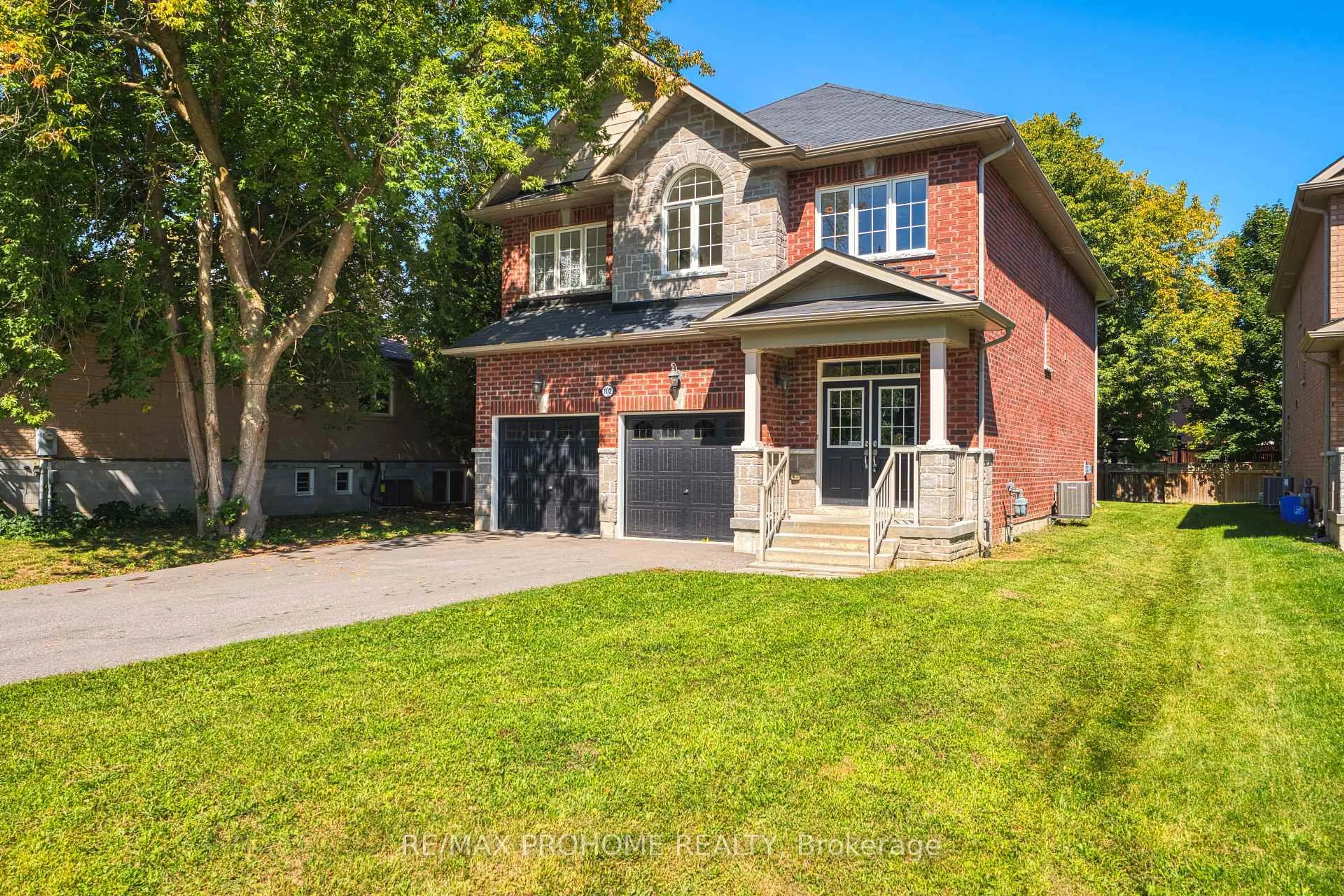 Home with brick exterior material, street for 102 Riveredge Dr, Georgina Ontario L4P 2P1