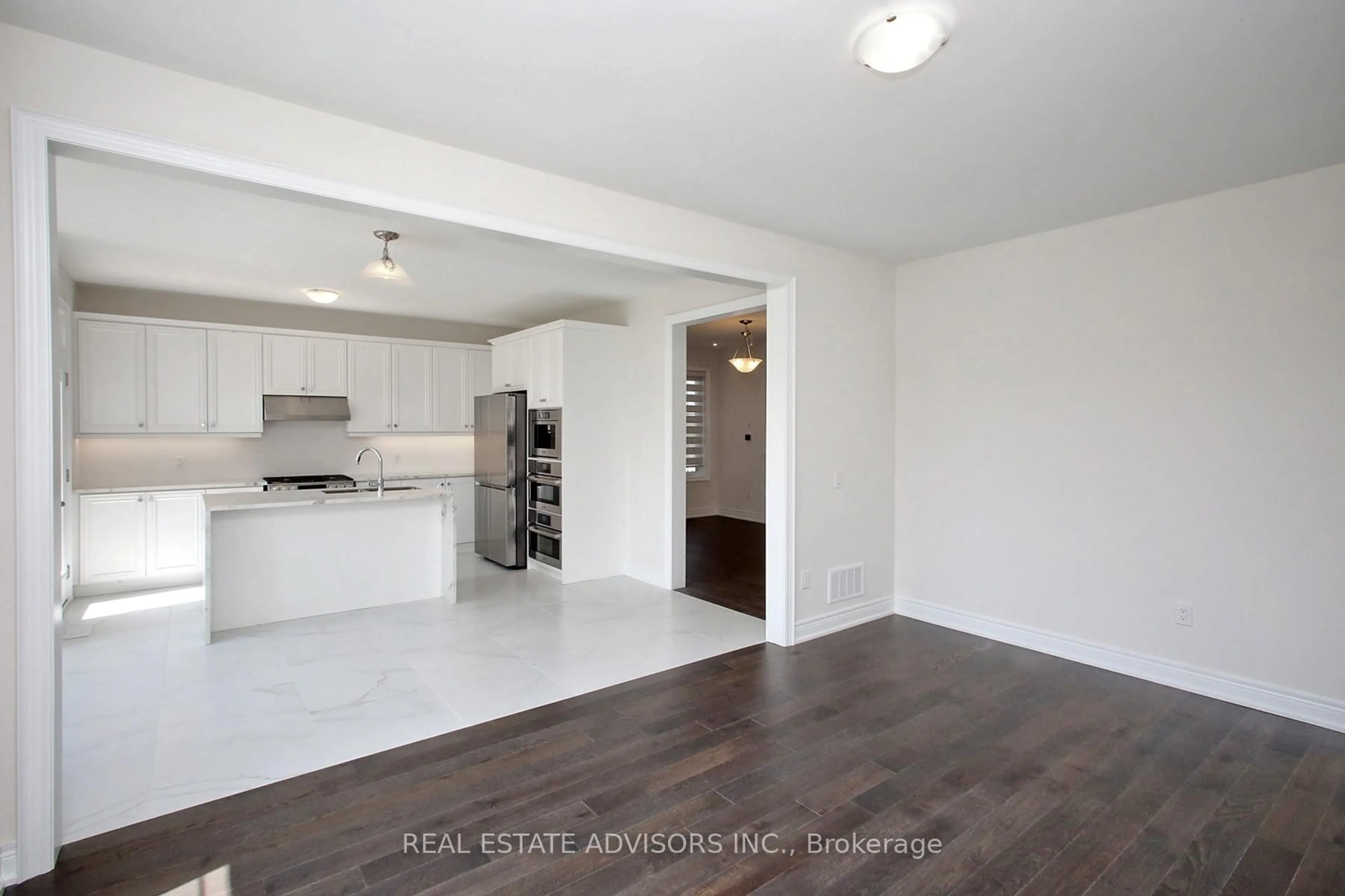 Open concept kitchen, wood/laminate floor for 289 Ben Sinclair Ave, East Gwillimbury Ontario L9N 0Z1