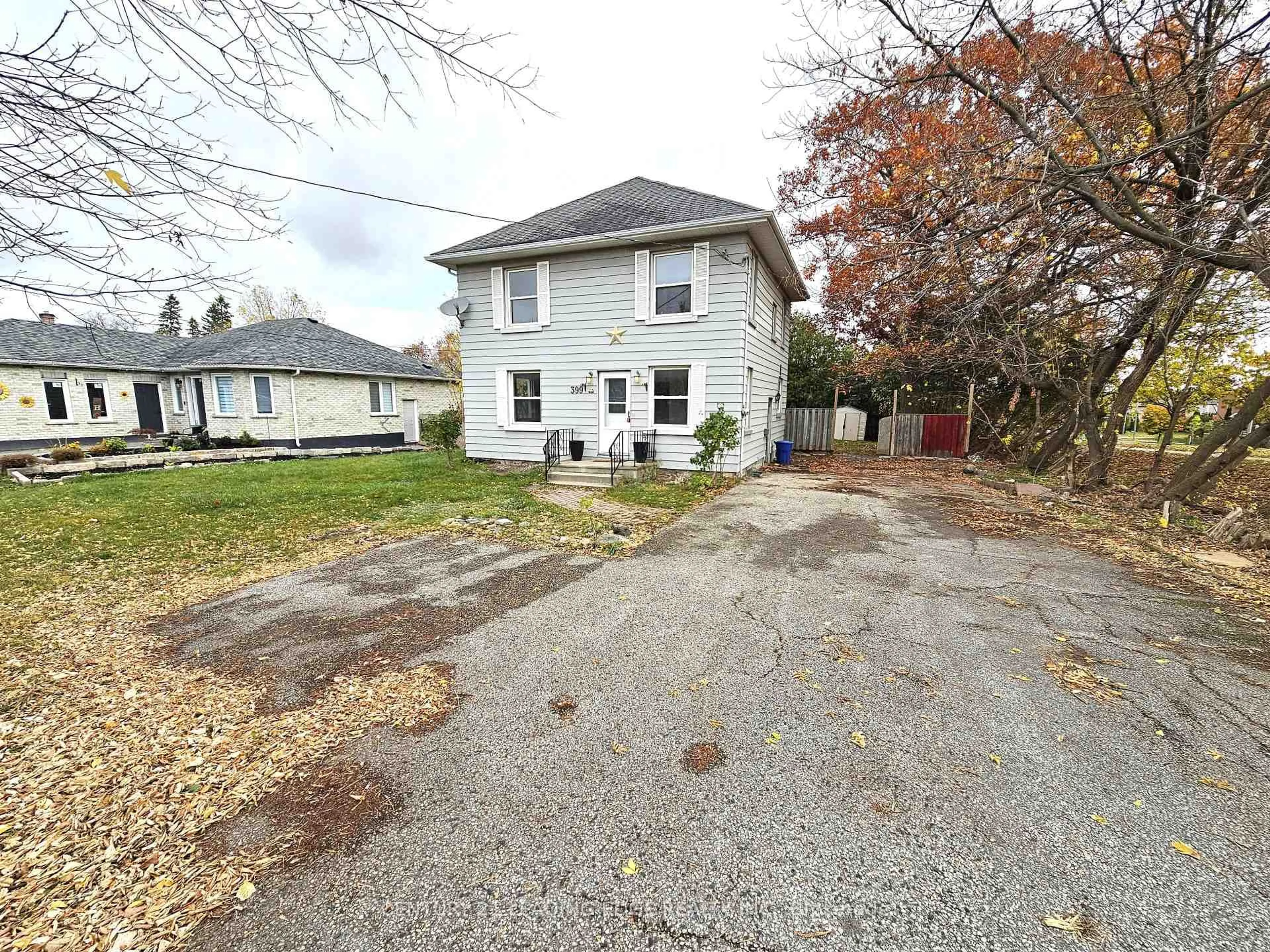 A pic from outside/outdoor area/front of a property/back of a property/a pic from drone, street for 399 The Queensway South, Georgina Ontario L4P 2C6