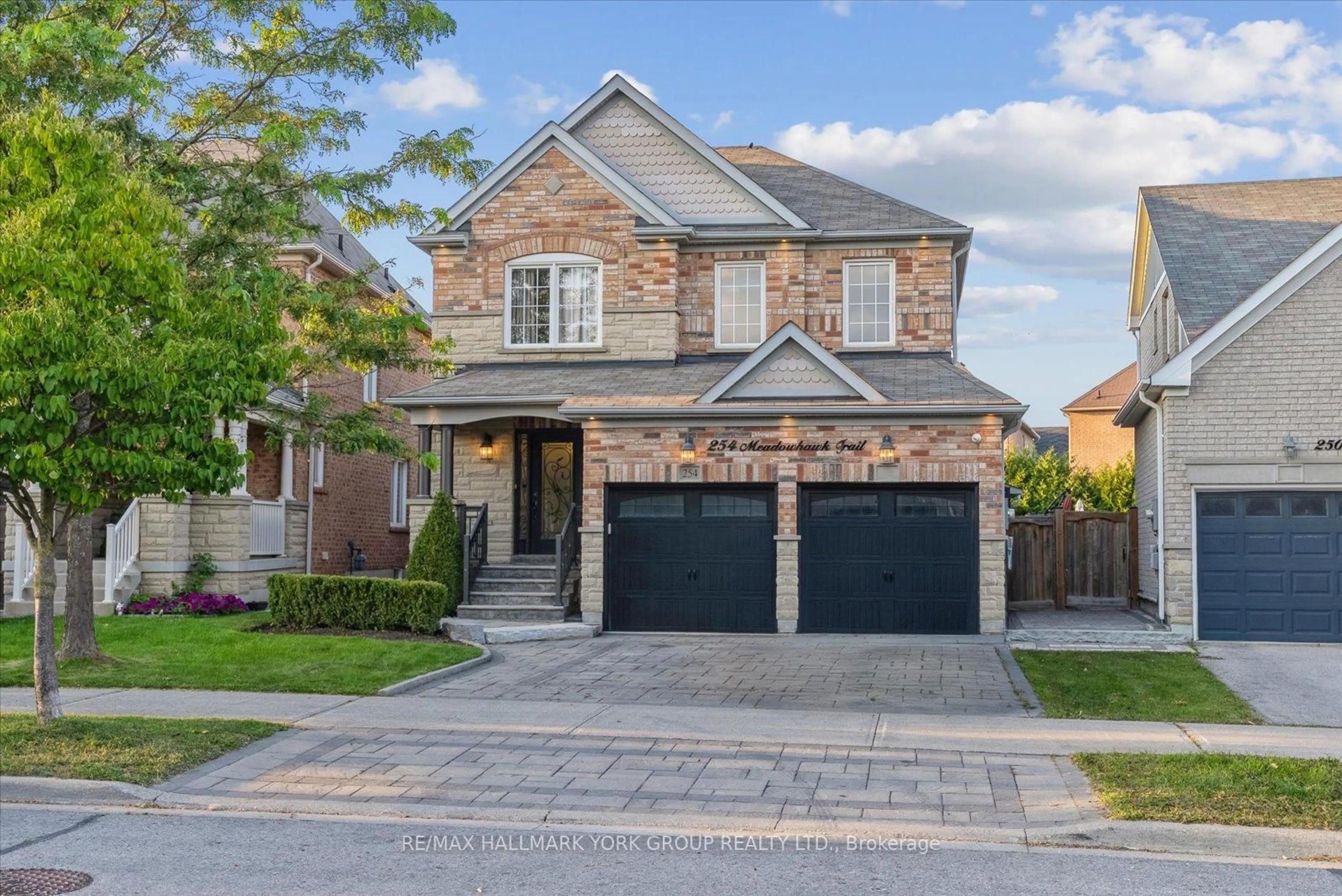 Home with brick exterior material, street for 254 Meadowhawk Tr, Bradford West Gwillimbury Ontario L3Z 0E9