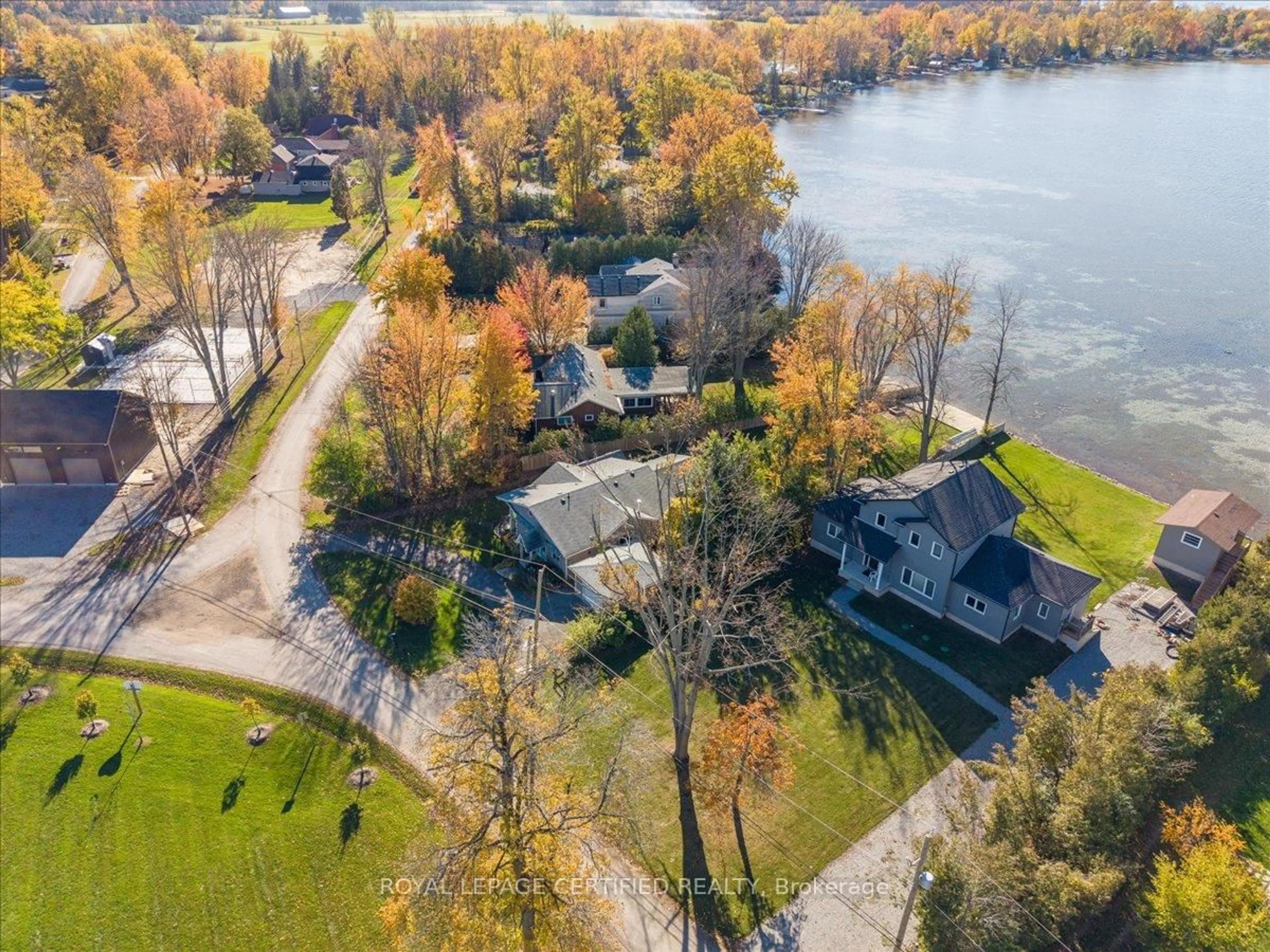 A pic from outside/outdoor area/front of a property/back of a property/a pic from drone, water/lake/river/ocean view for 598 Duclos Point Rd, Georgina Ontario L0E 1N0