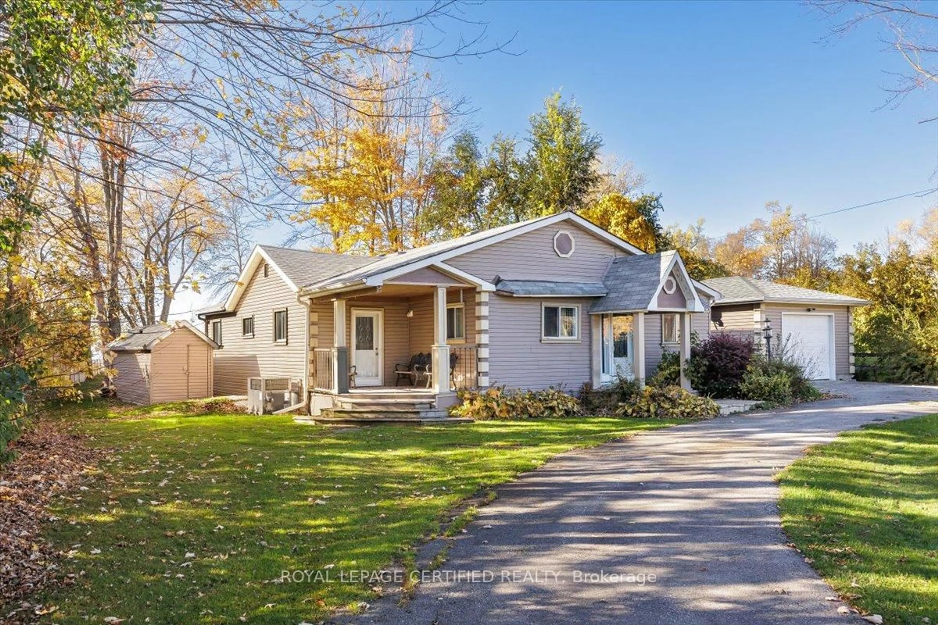 Home with vinyl exterior material, street for 598 Duclos Point Rd, Georgina Ontario L0E 1N0